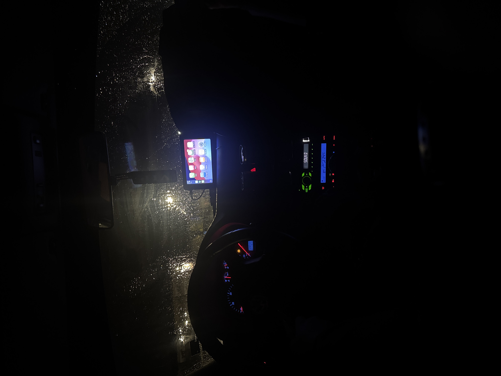 Nighttime car interior view during rain in Bulgaria