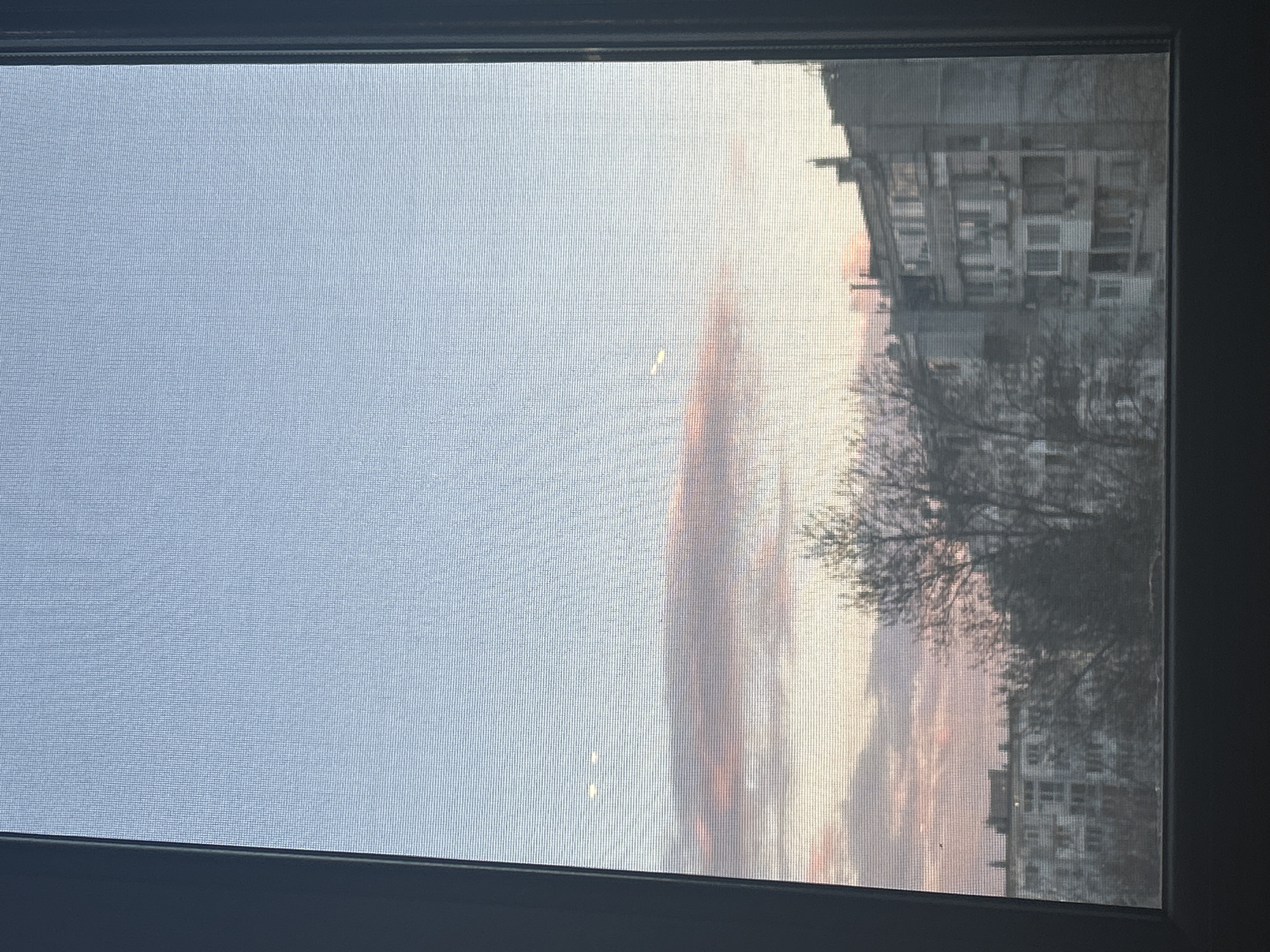 Sunset colors captured through window in Varna, Bulgaria