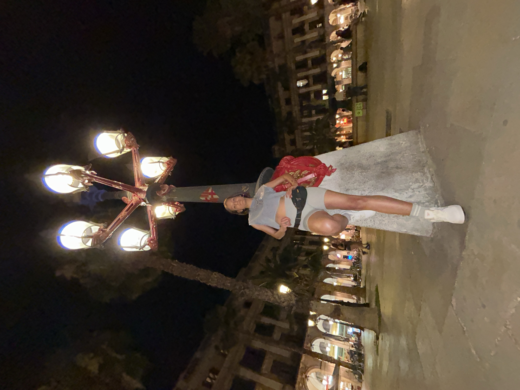 Evening crowds gather in Barcelona's central plazas for photos