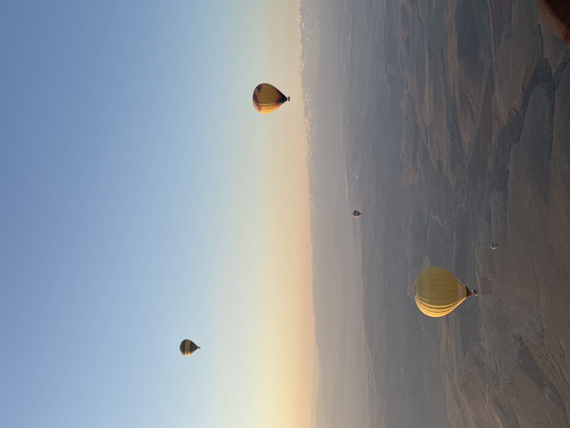 Dawn hot air balloon flight documented over Yeşilhisar Turkey