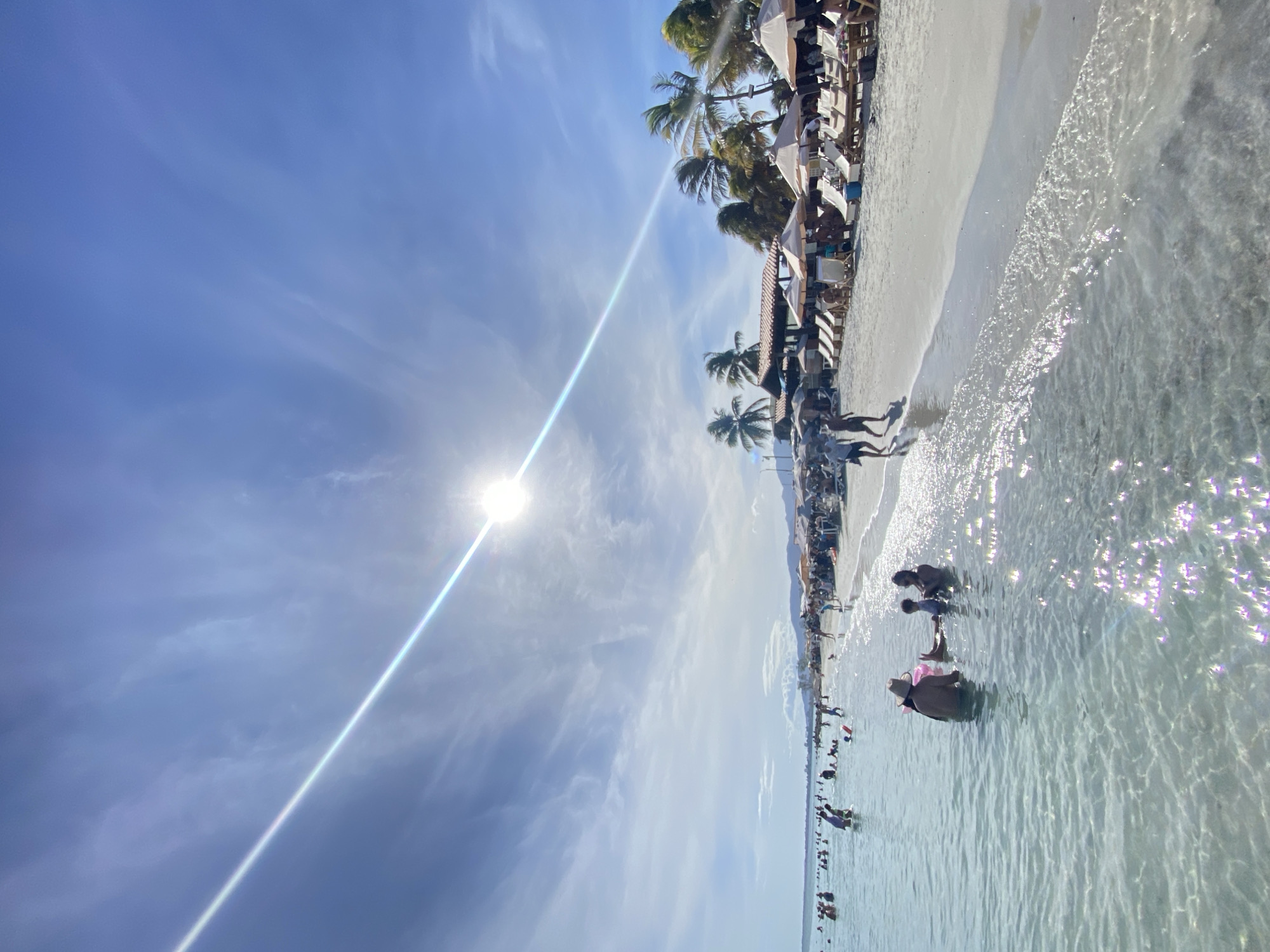 Busy beach afternoon on Margarita Island's turquoise shores
