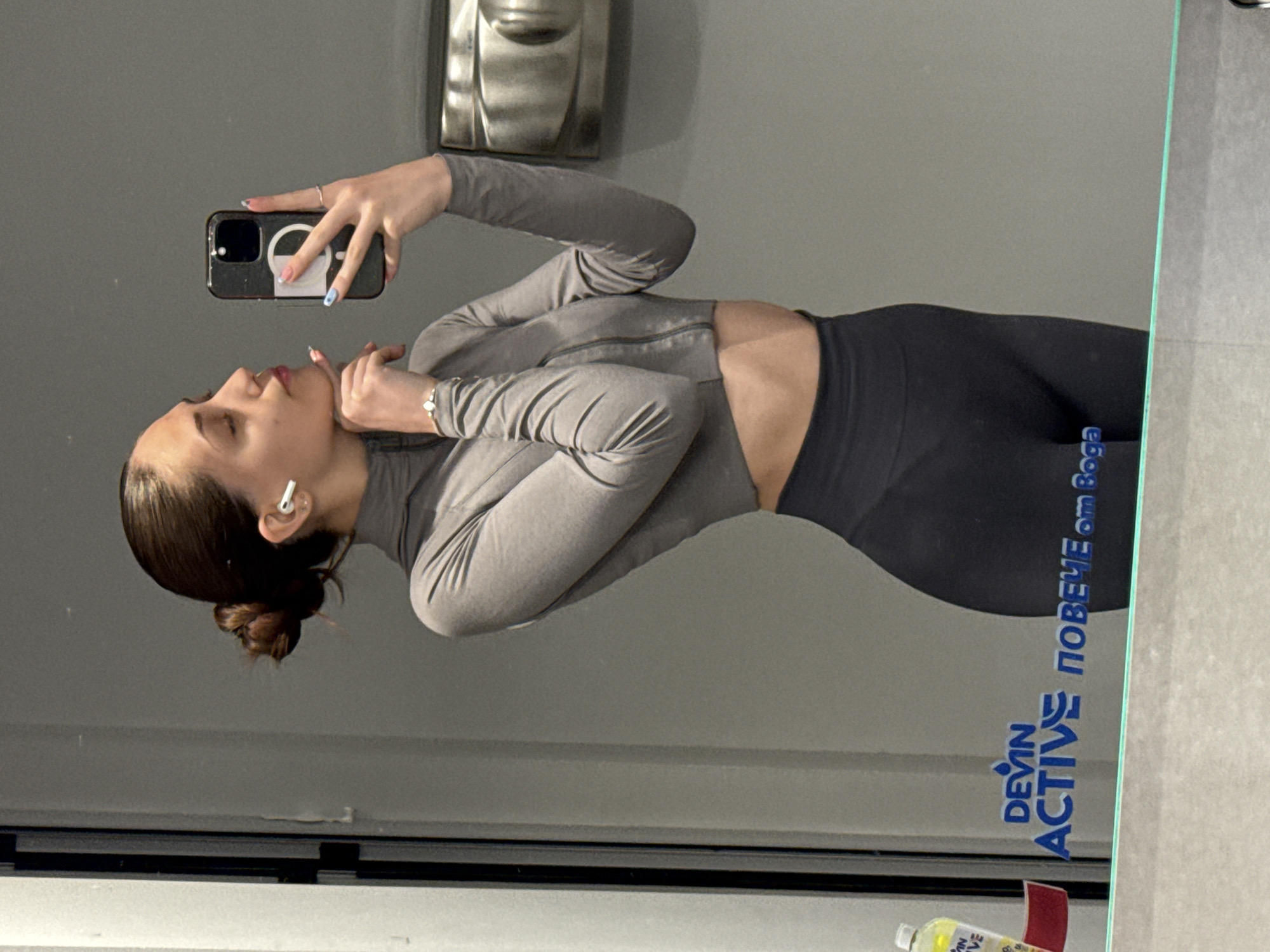 Woman Takes Mirror Selfie in Sofia Bathroom