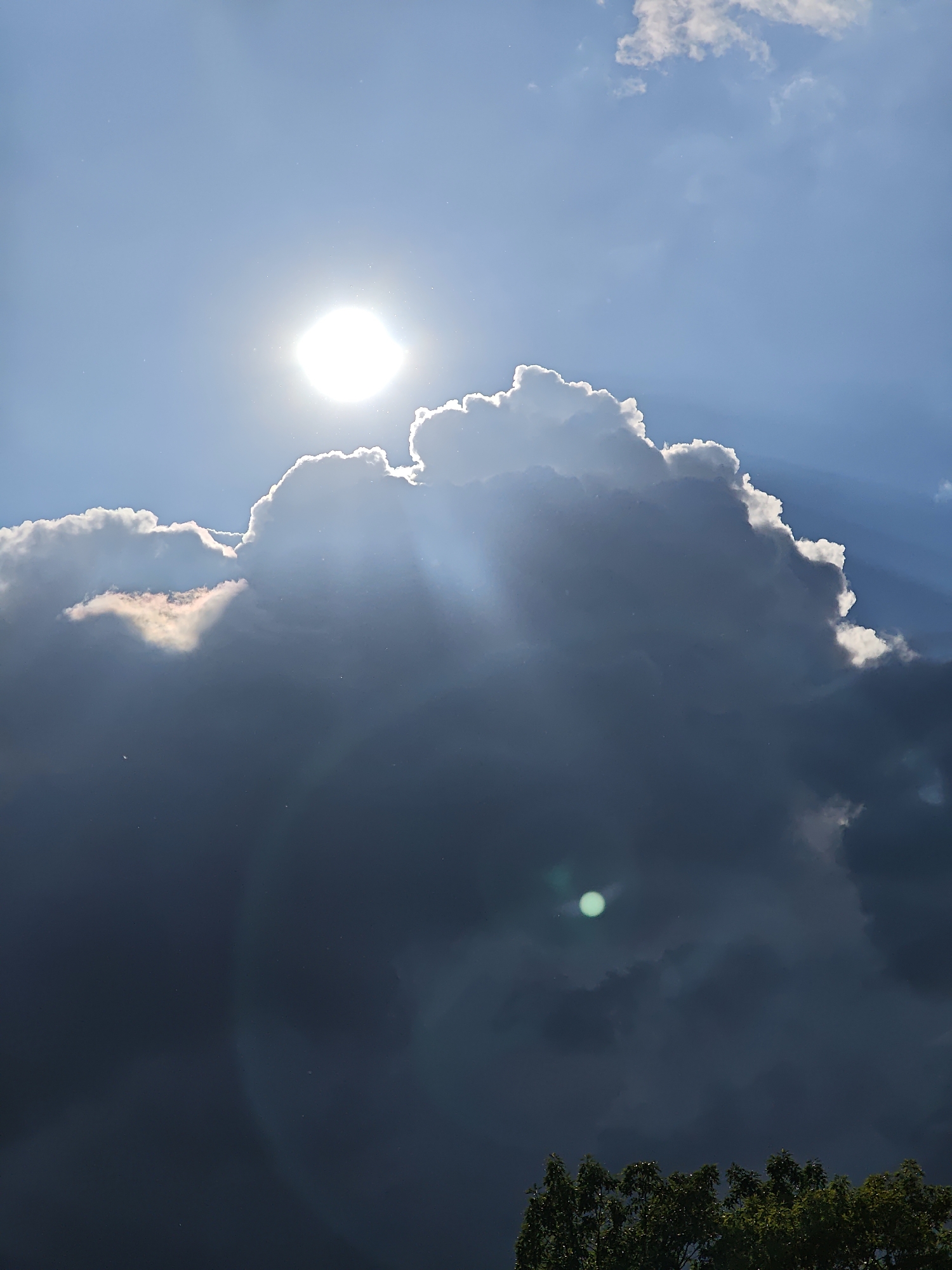 Dramatic sunbeams break through storm clouds over Vratsa, Bulgaria