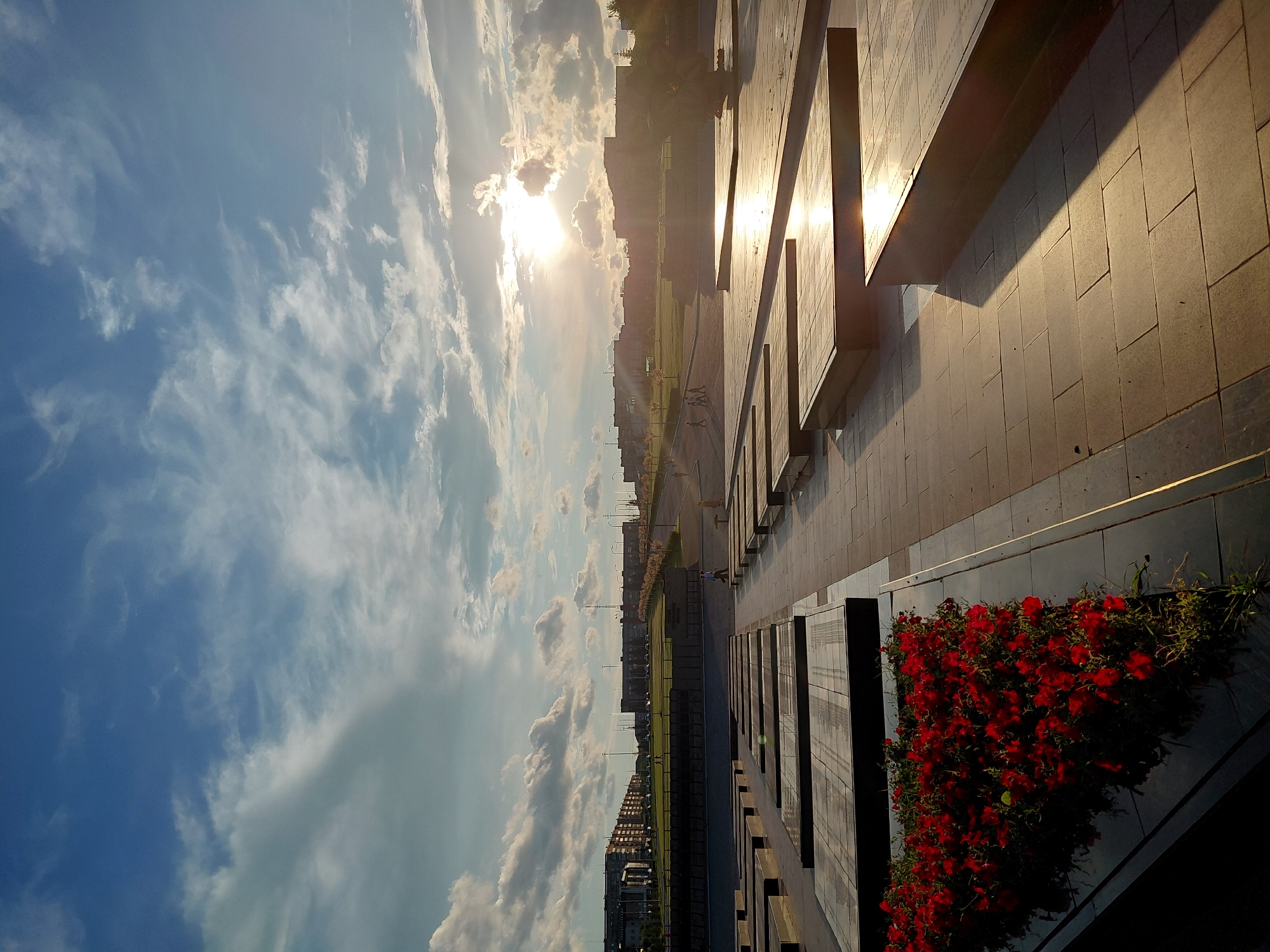 Exploring Magnitogorsk monuments and riverfront on a summer evening