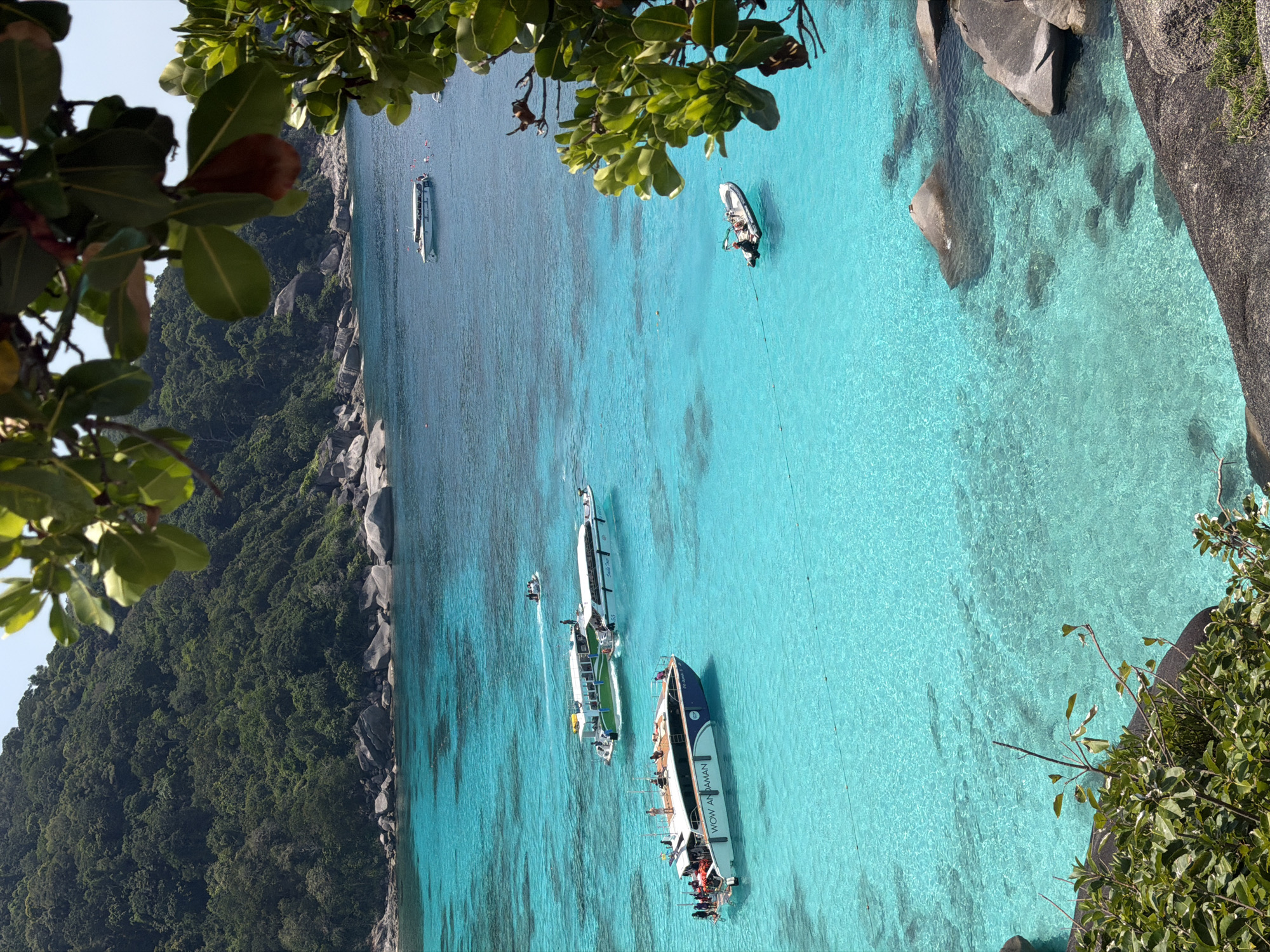 Tourists enjoy snorkeling and sightseeing at Thailand's Similan Islands