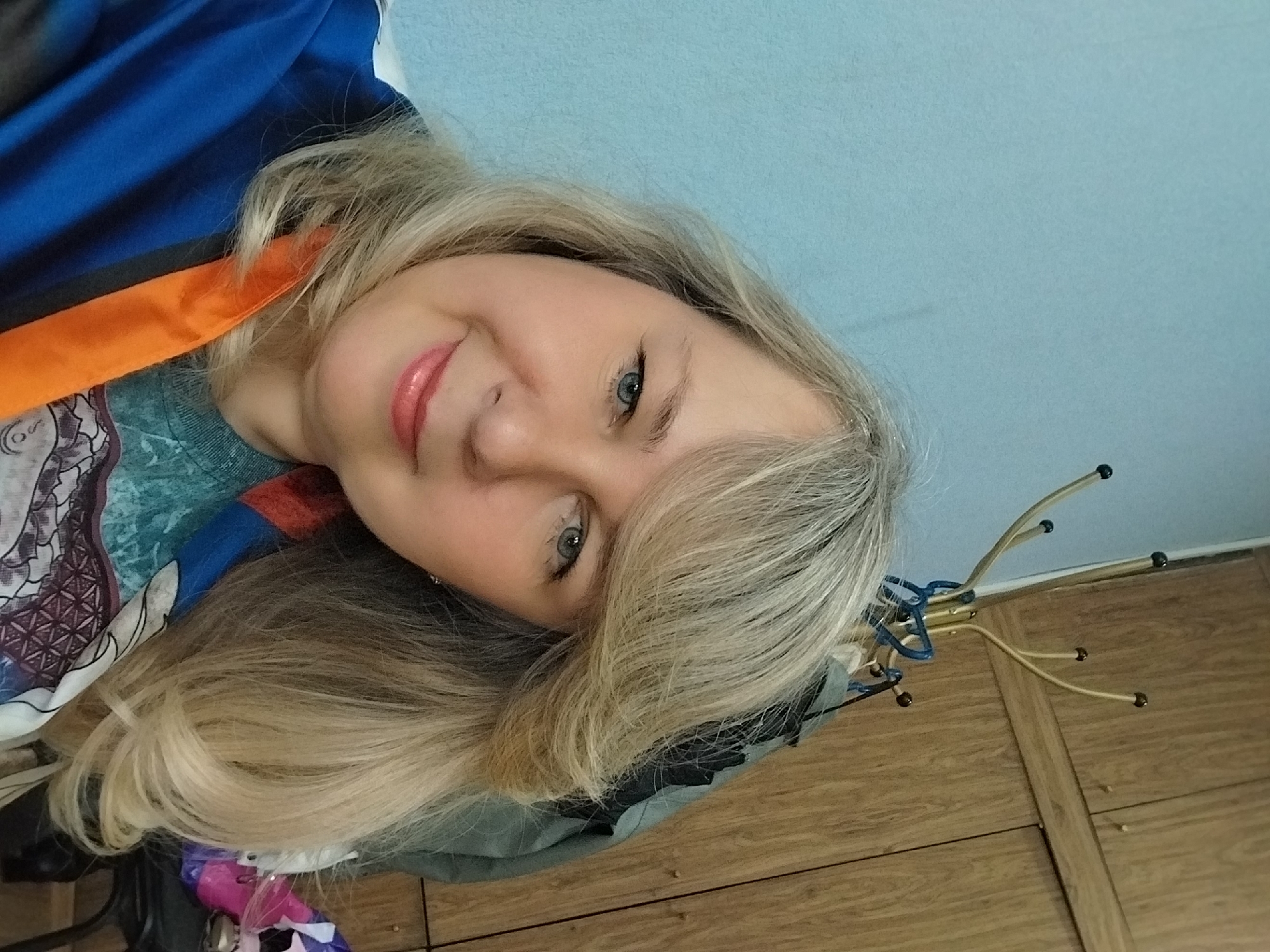 Woman takes selfies indoors in Orenburg, Russia