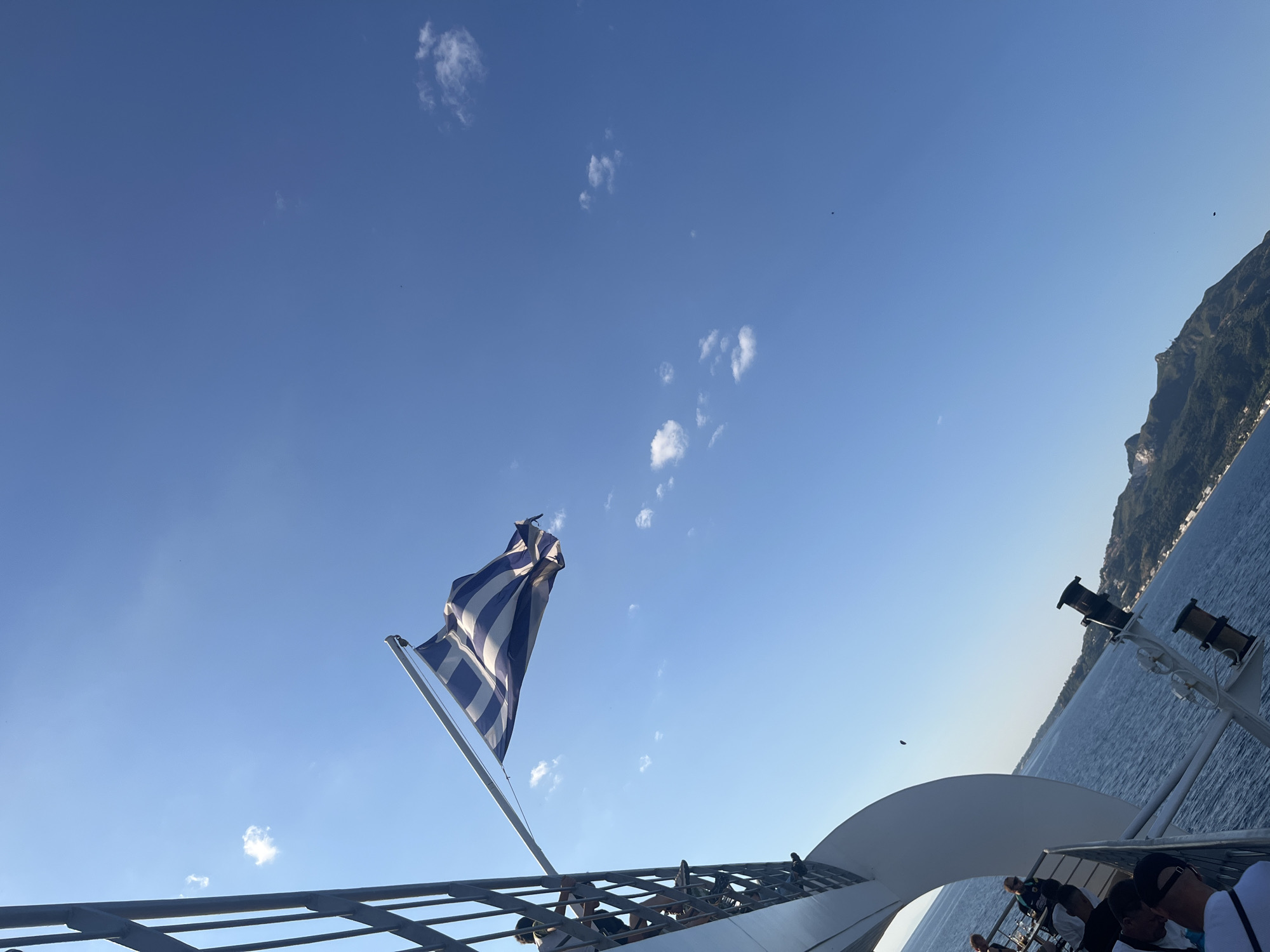 Ferry leaving Zakynthos harbor on a bright June morning