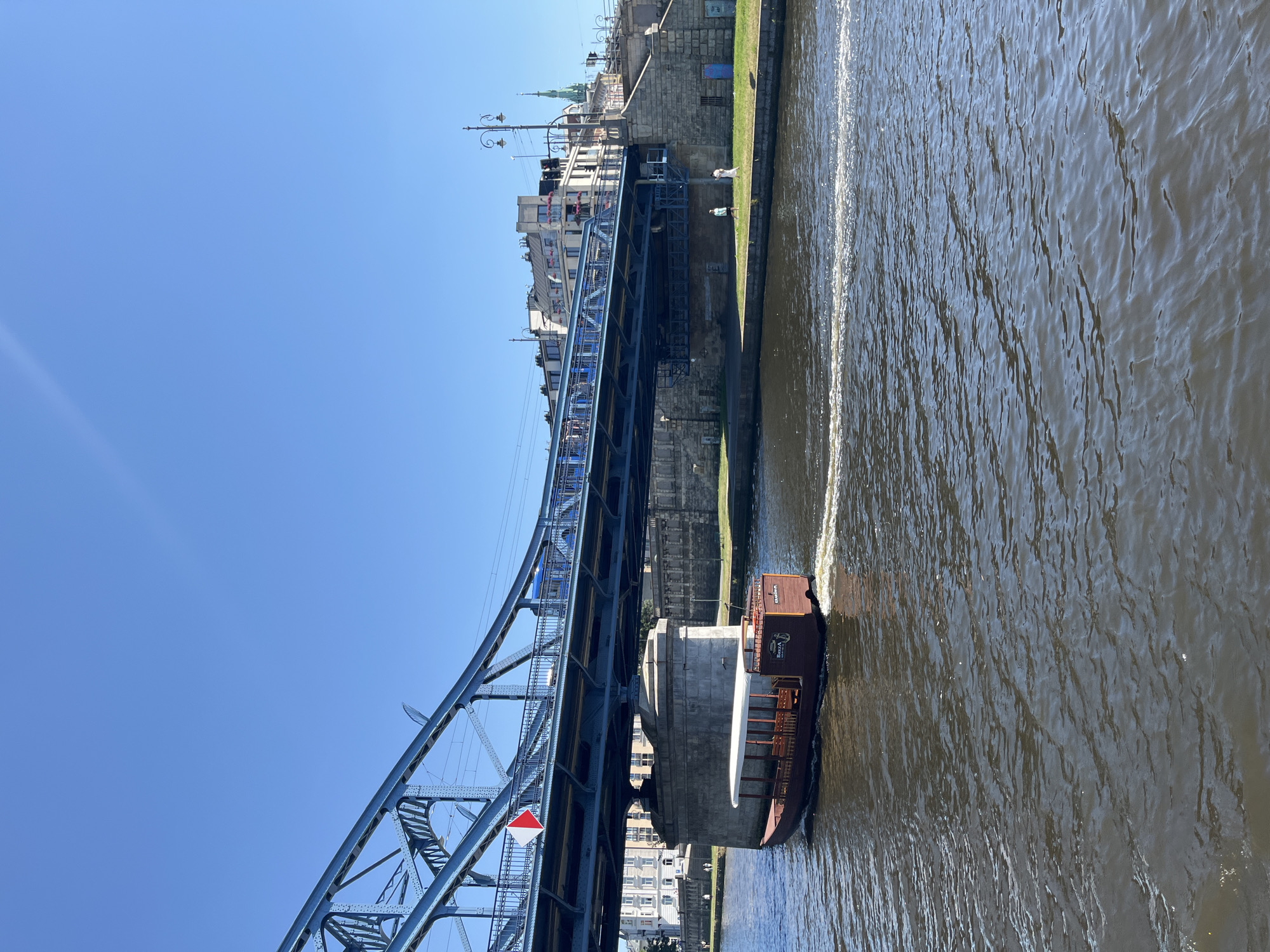 Tour boat cruising the Vistula River in Kraków