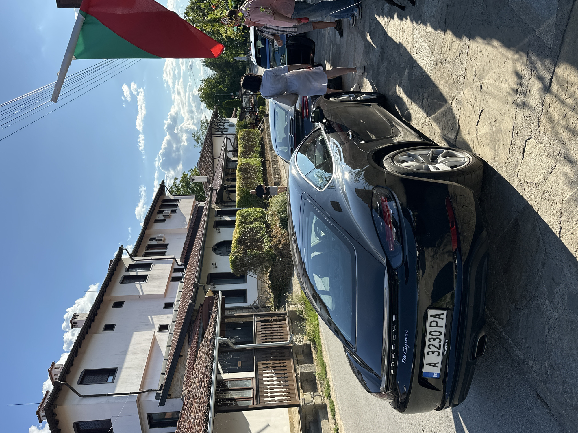 Porsches parked outside a traditional restaurant in Arbanassi, Bulgaria