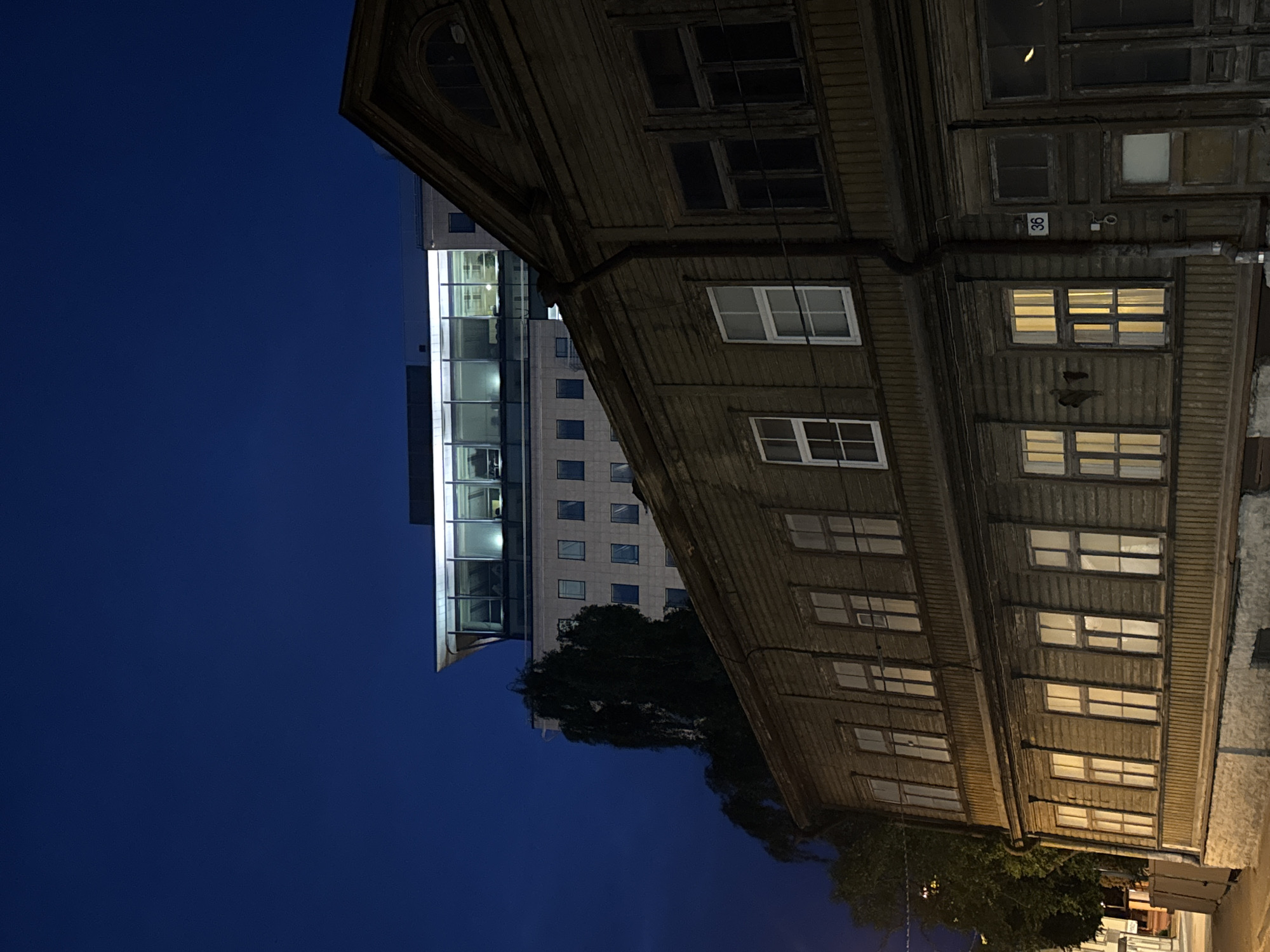 Evening street documentation captures Tallinn storefronts and architecture