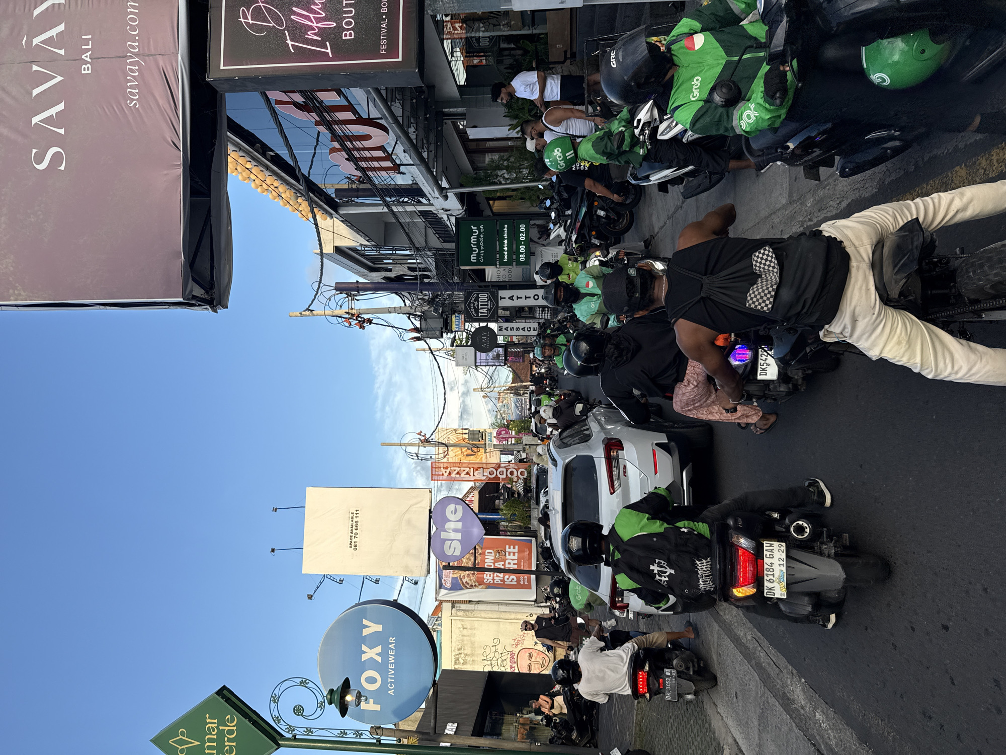 Rush hour traffic clogs North Kuta streets with delivery drivers