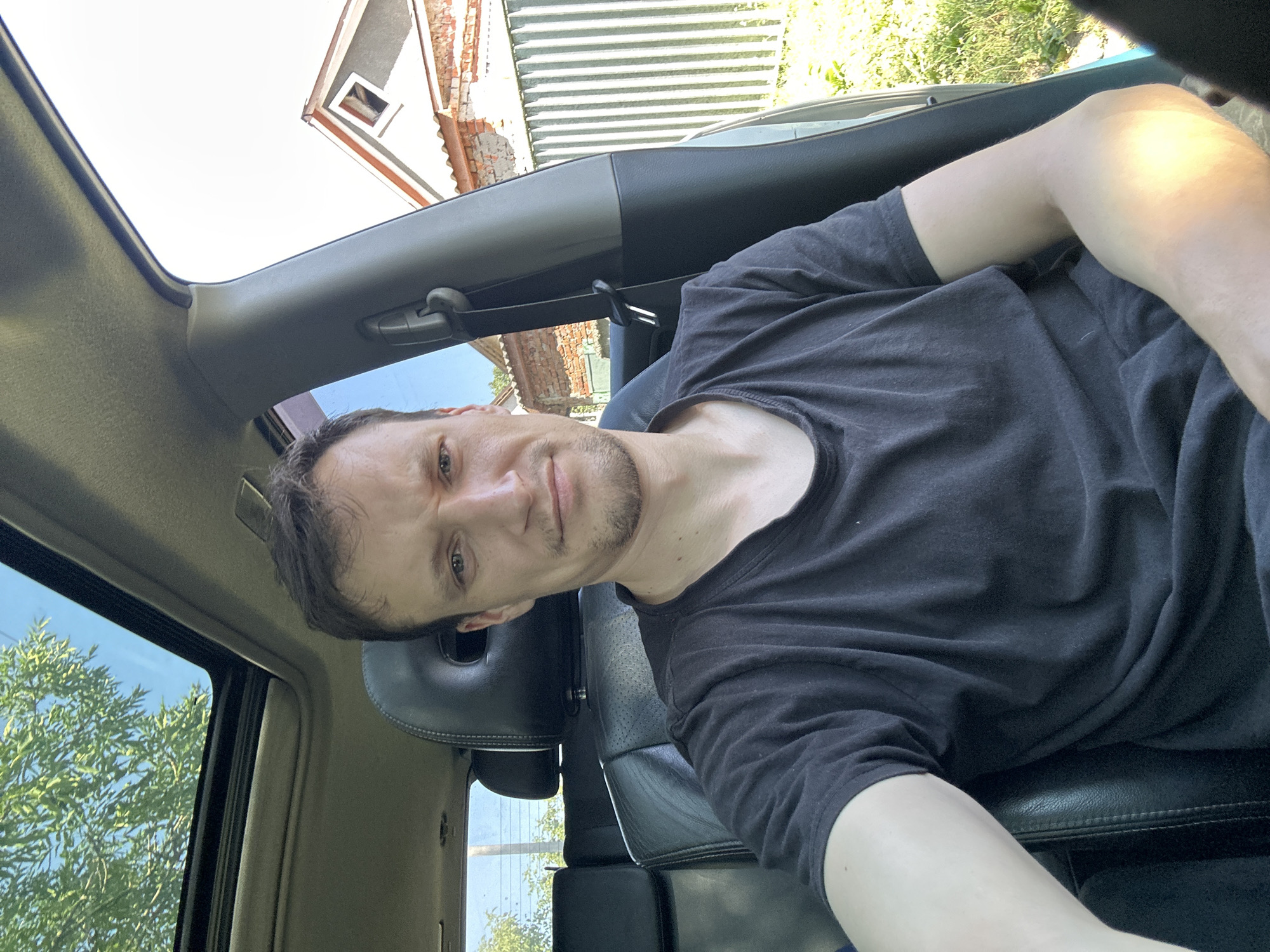 Chilling in a parked car in Makiv, Ukraine, summer morning