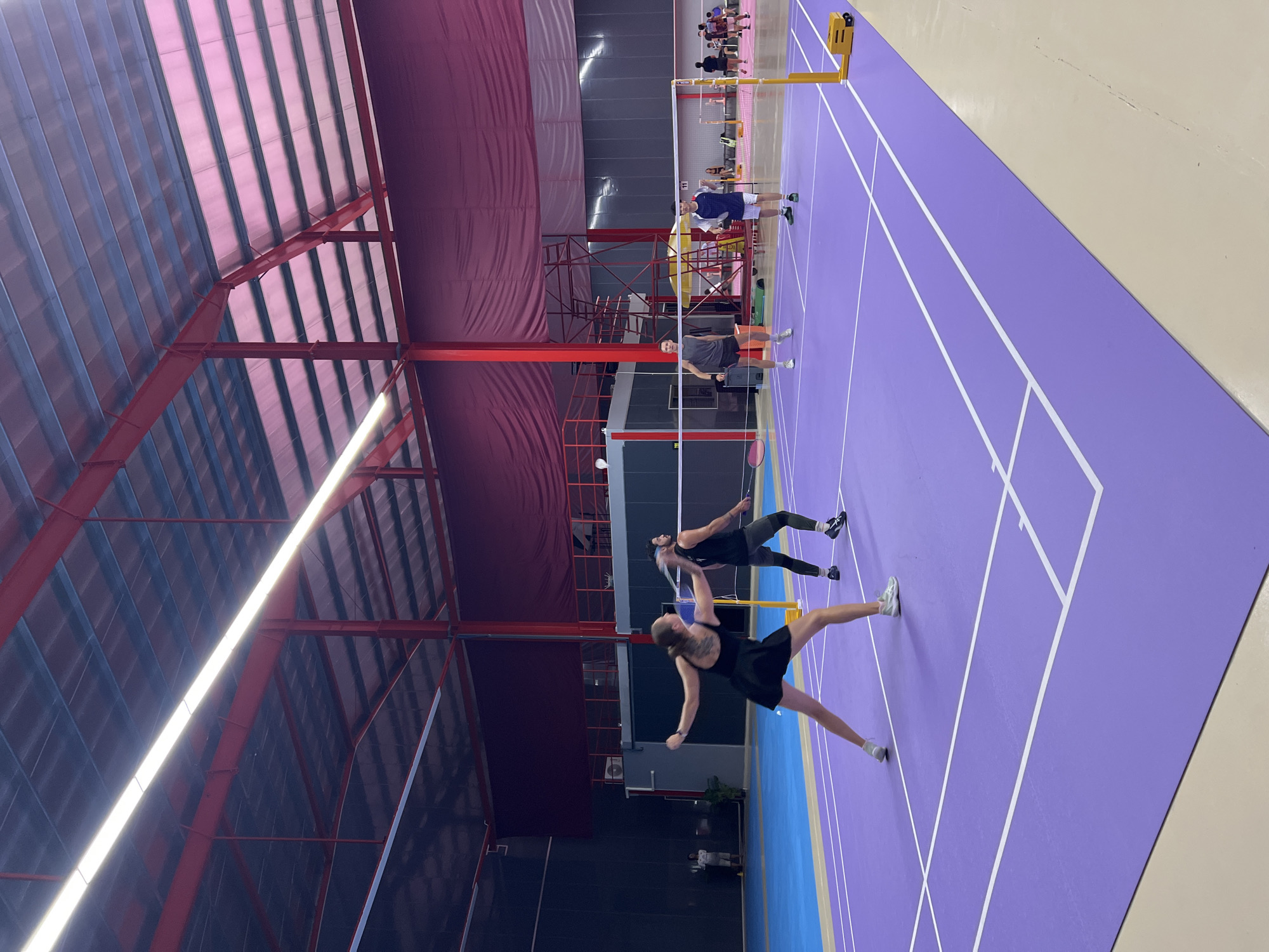 Badminton game played on purple court in Ko Samui