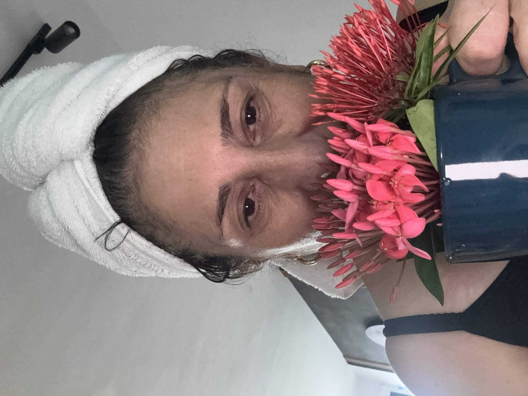 Morning in a Kuala Lumpur apartment: coffee, flowers, city views