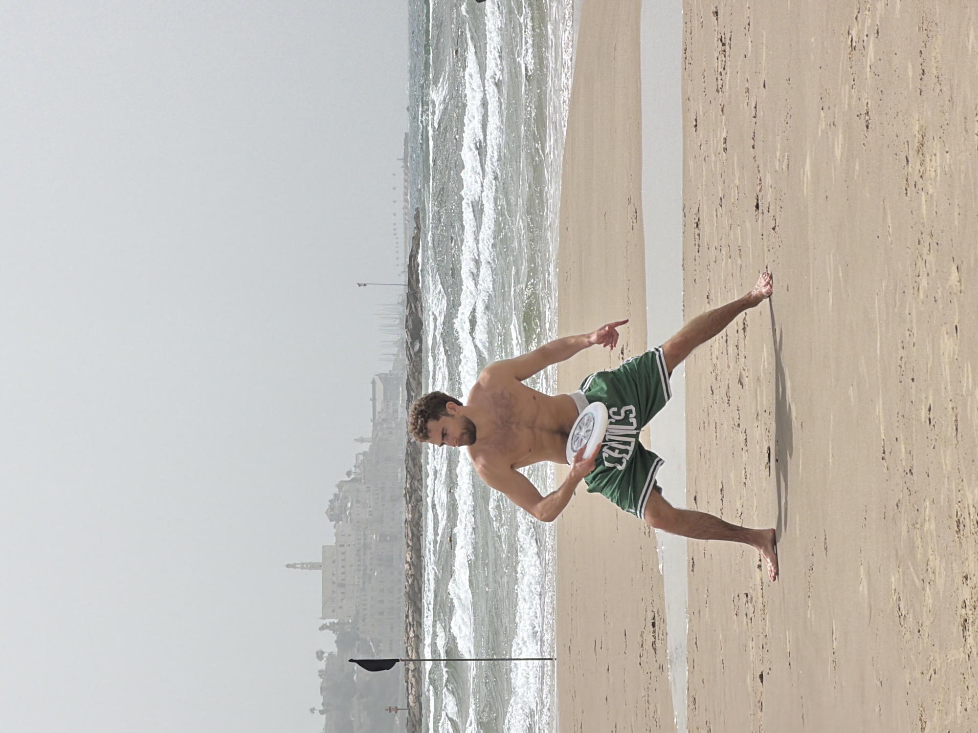 Man in Celtics shorts spotted on Tel Aviv beach