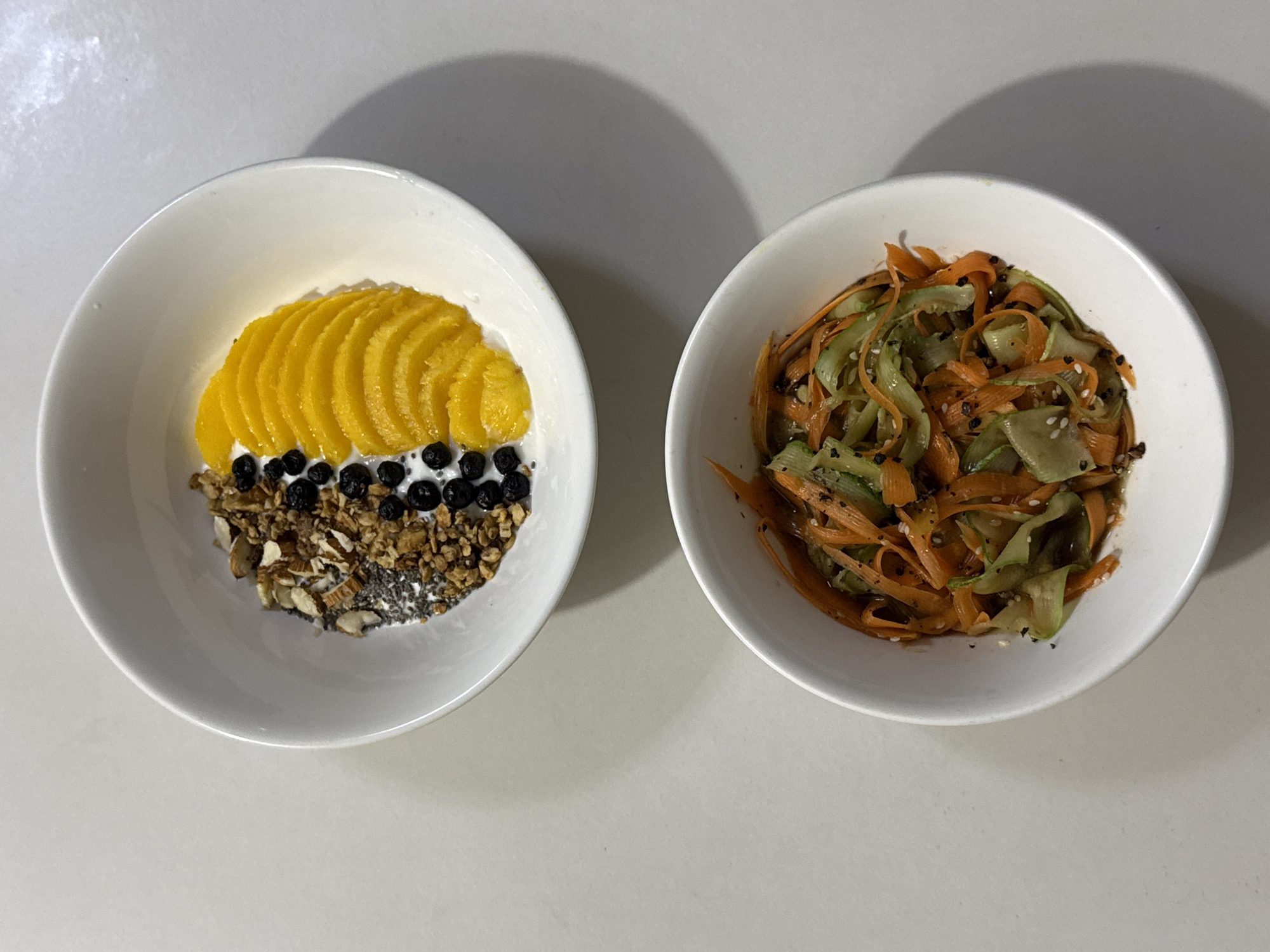 Lunch meal with yogurt bowl and vegetable salad documented Davao