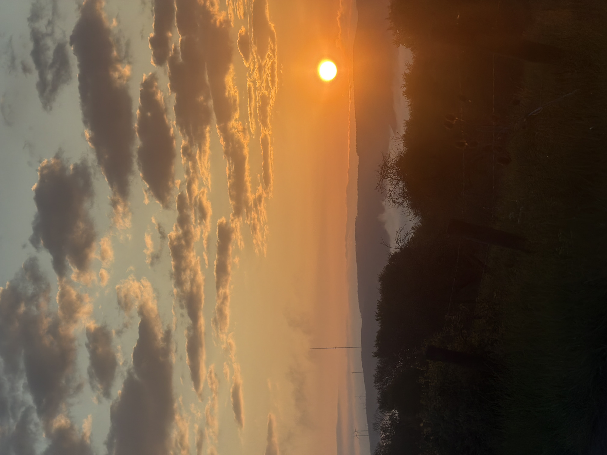 Sunset observed through clouds in Saarburg, Germany
