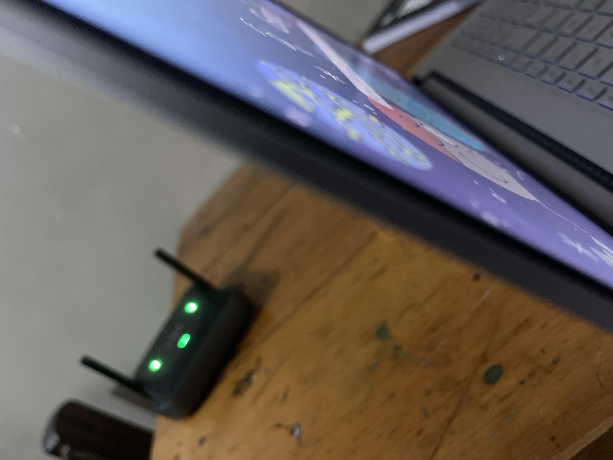 Person documents home office setup in Dar es-Salaam