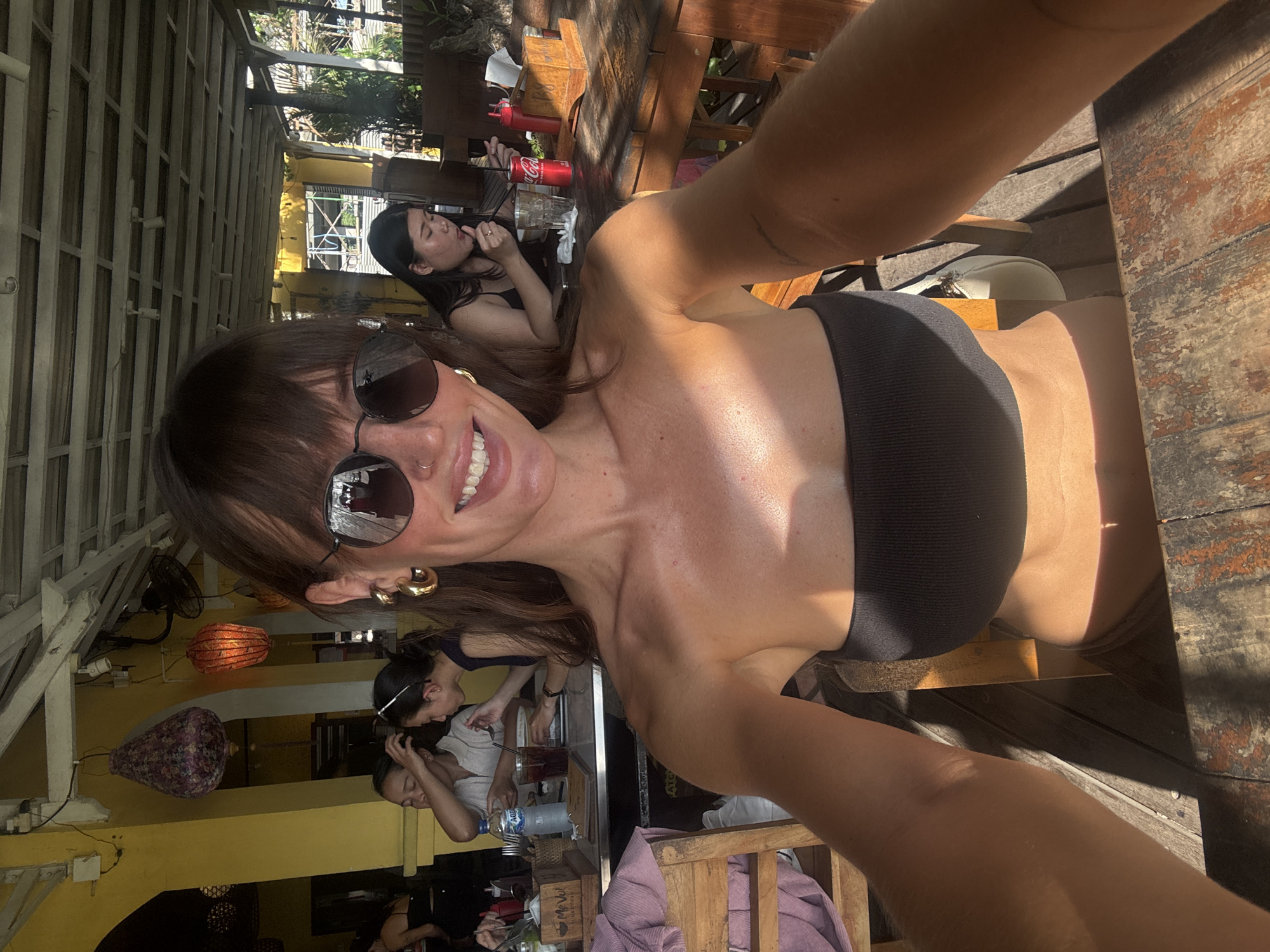Woman enjoys morning meal at North Kuta outdoor restaurant