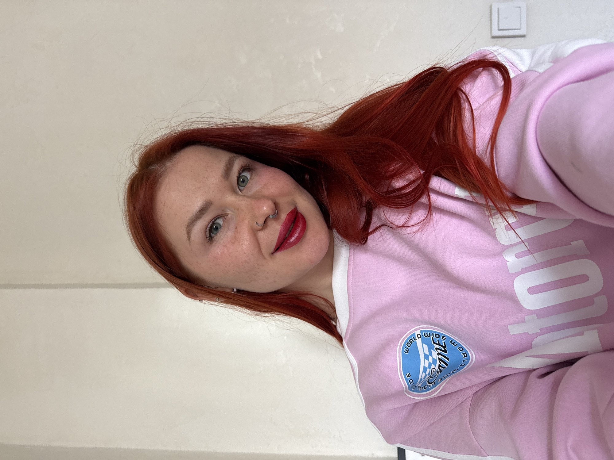 Red-haired woman takes selfies in Rostov-on-Don
