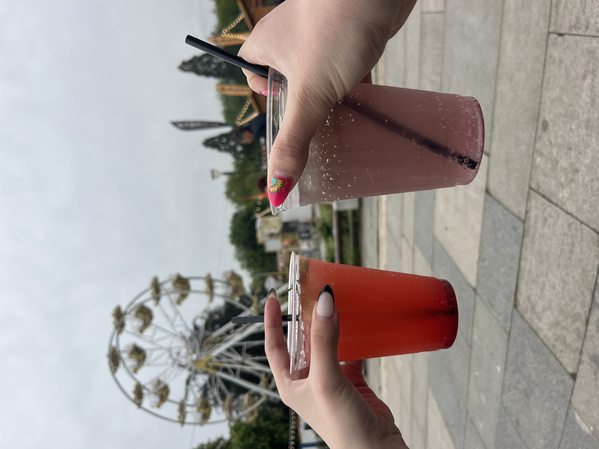 Visitors enjoy colorful drinks at Sofia amusement park