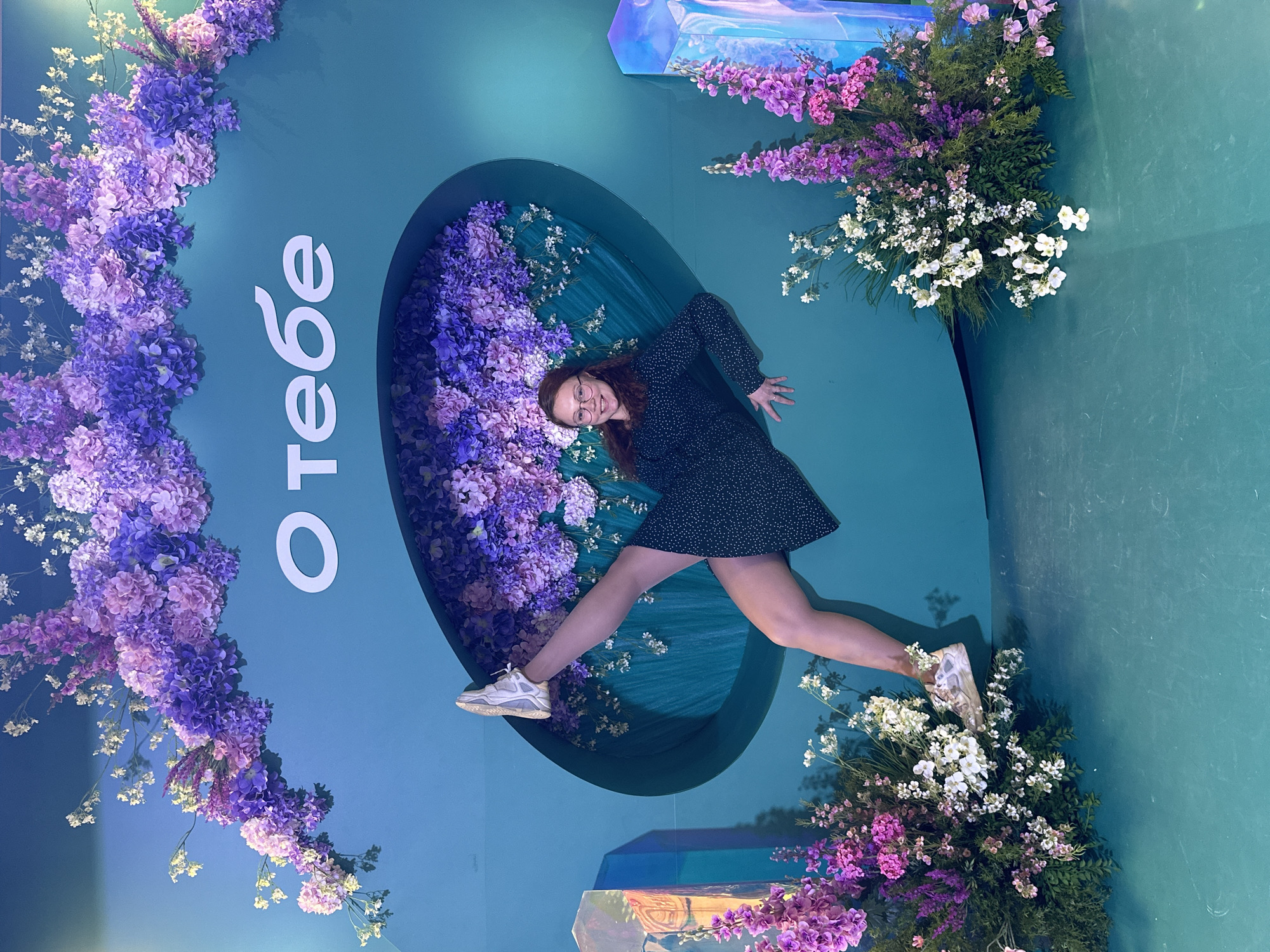 Woman Creates Illusion of Floating in Monchegorsk Photo