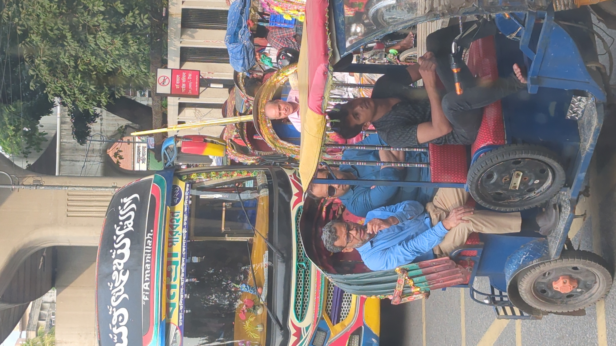 Rush hour traffic and street activity captured across Dhaka