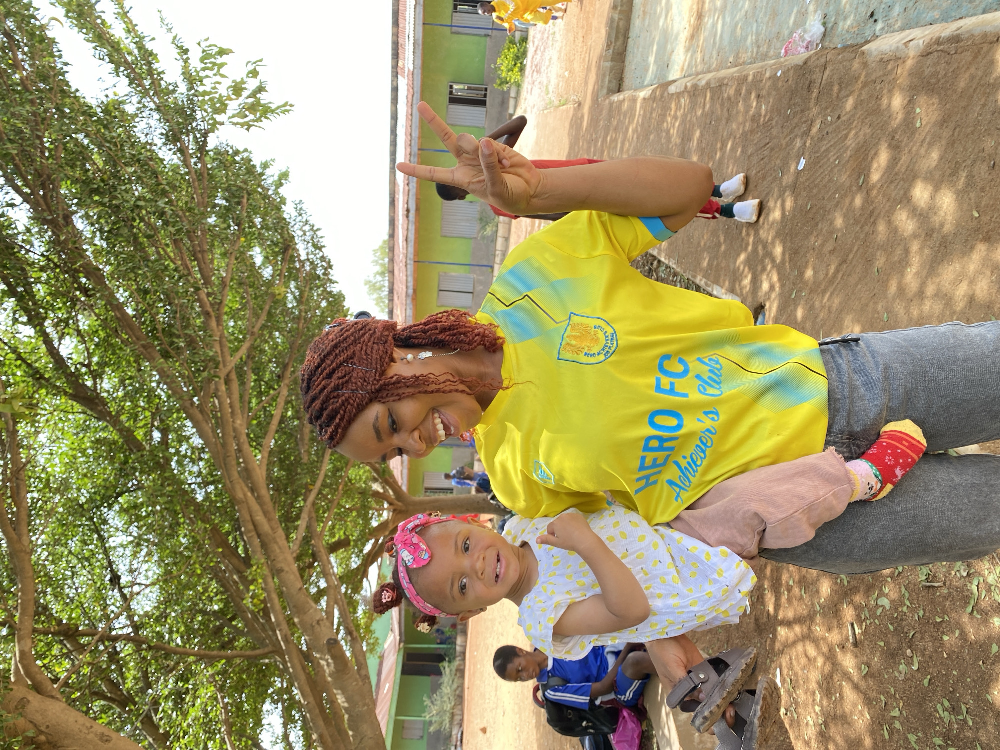 Woman and child share peaceful moment in Gura Top