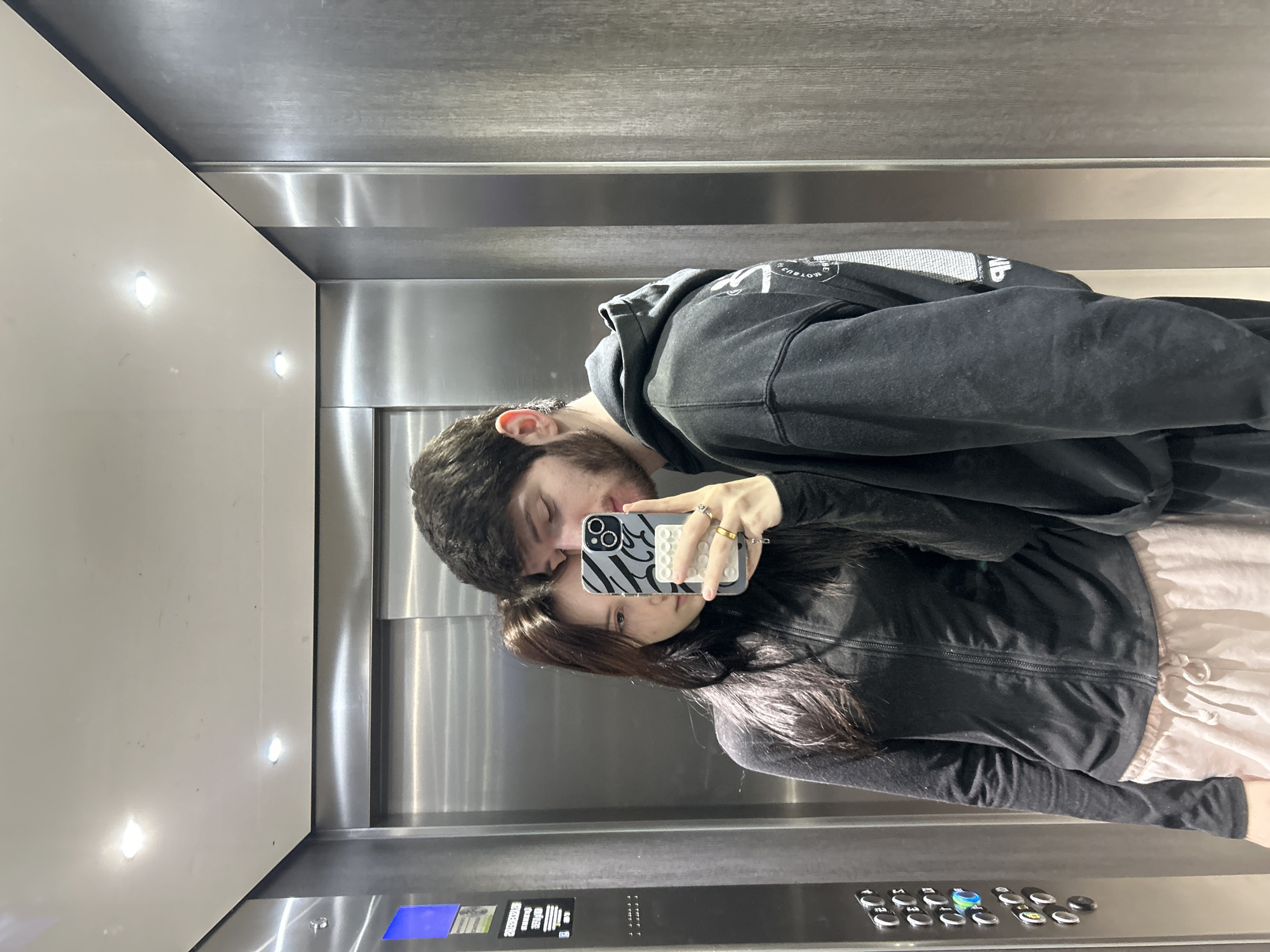 Couple Takes Selfie in Elevator in Cachan, France