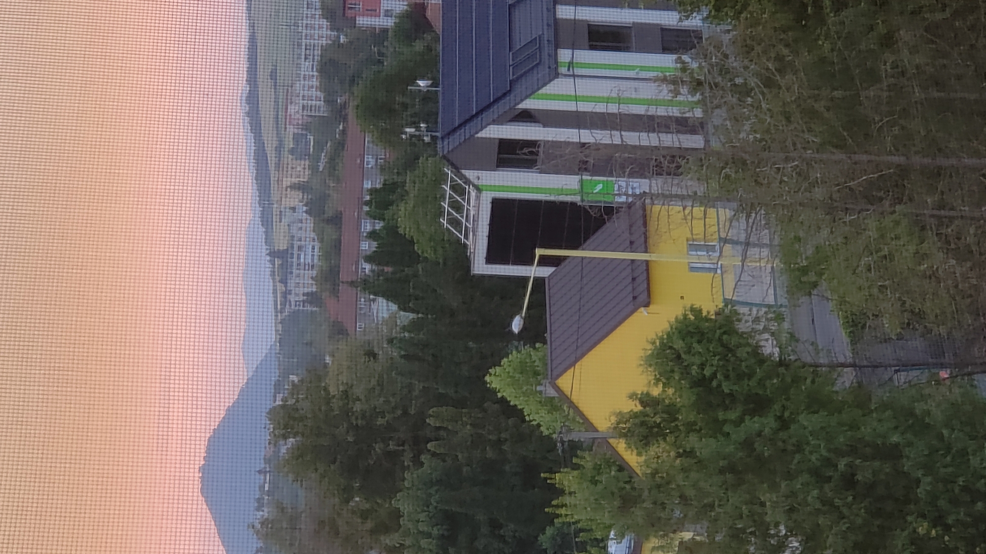 Evening views across Prešov rooftops, hills, and neighborhoods
