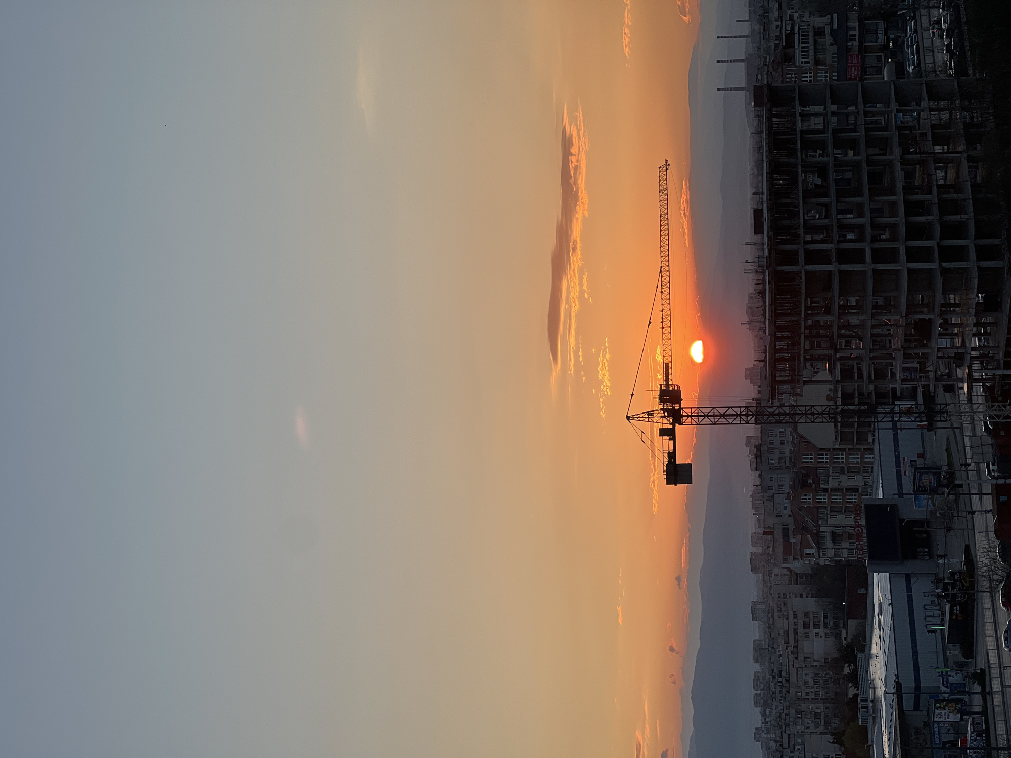 Sunrise observed over construction site in Sofia, Bulgaria