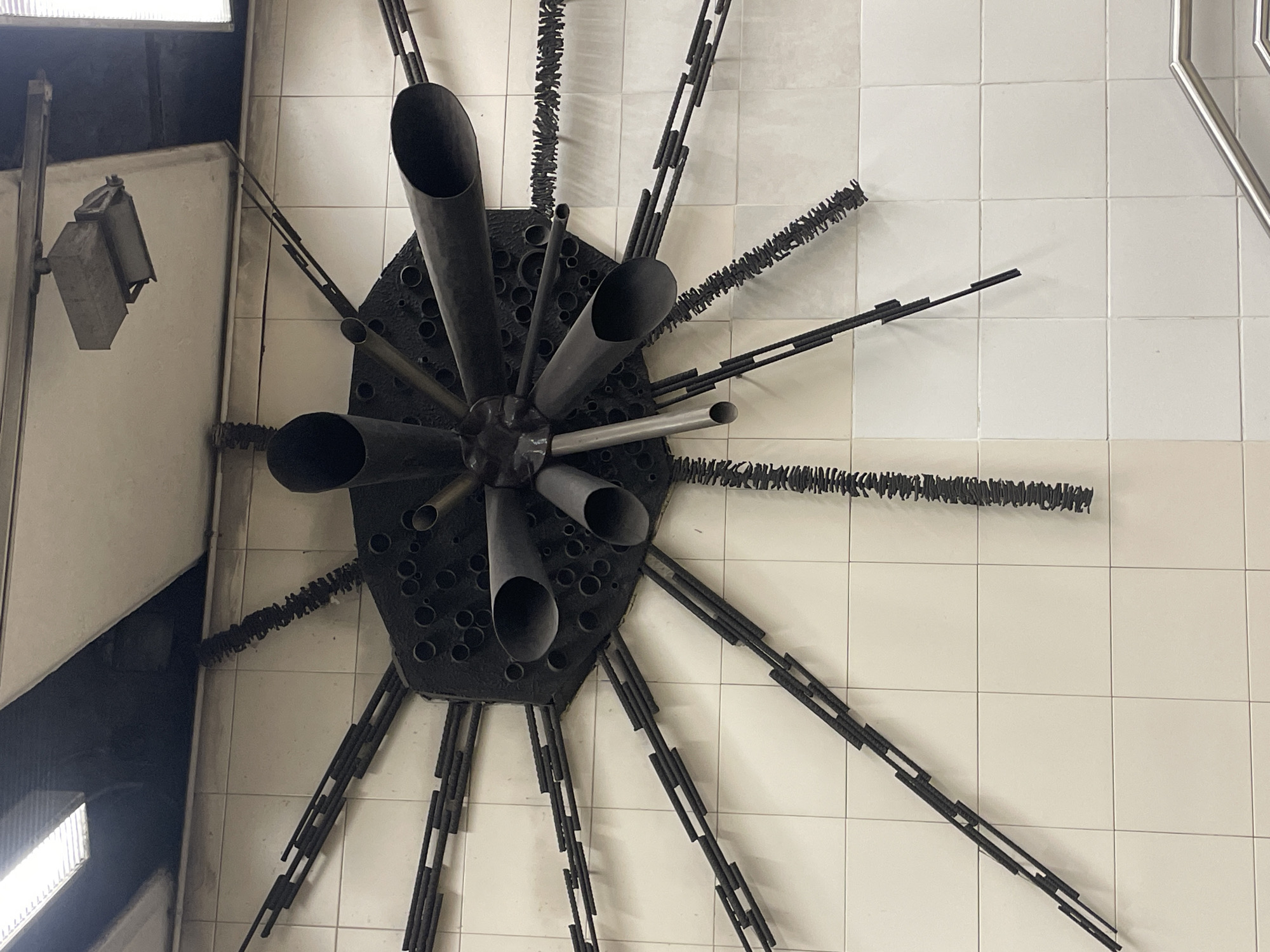 Perforated metal sculpture spotted on Barcelona wall
