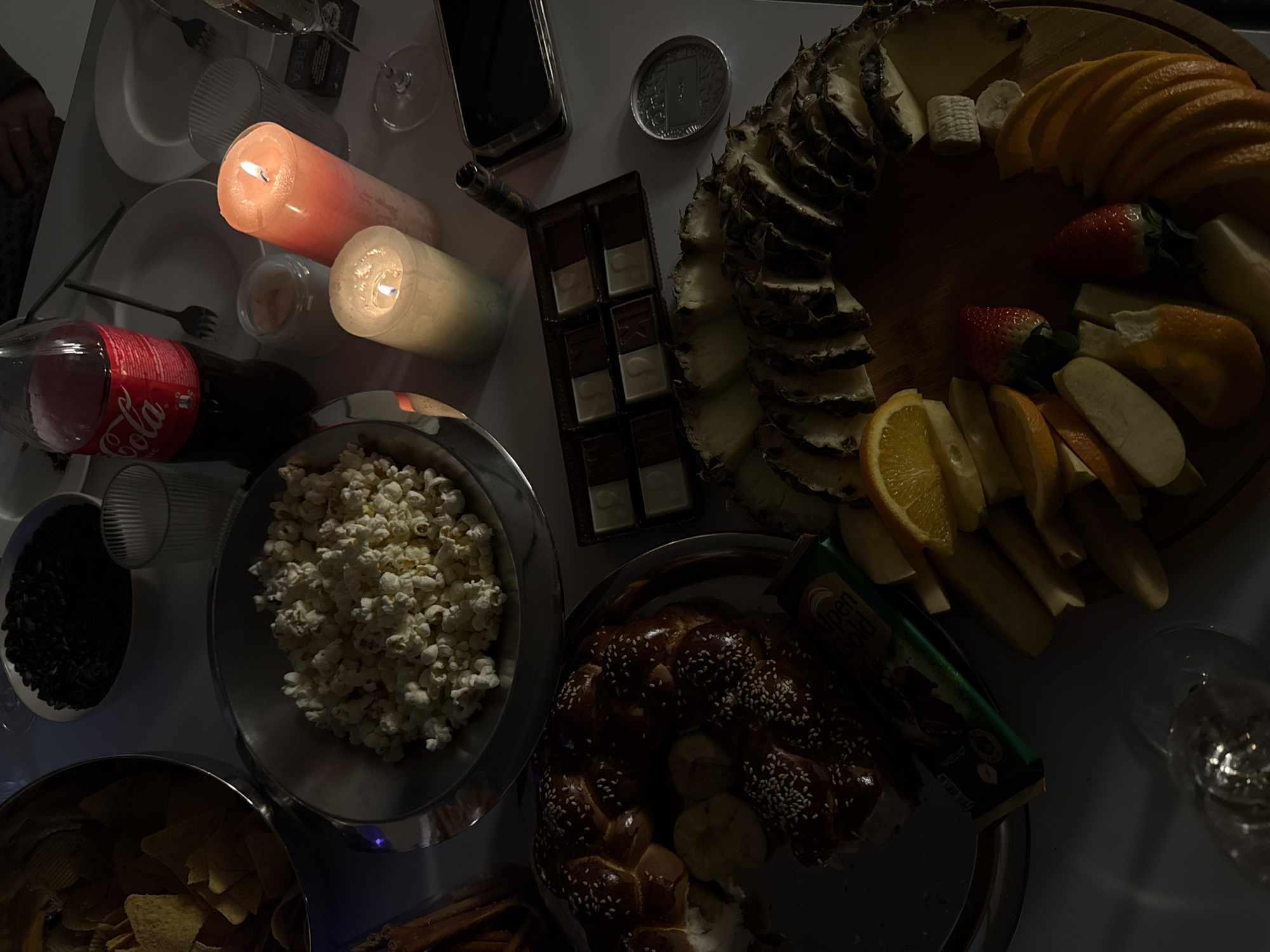 Food gathering documented in Yerevan with snacks and candlelight