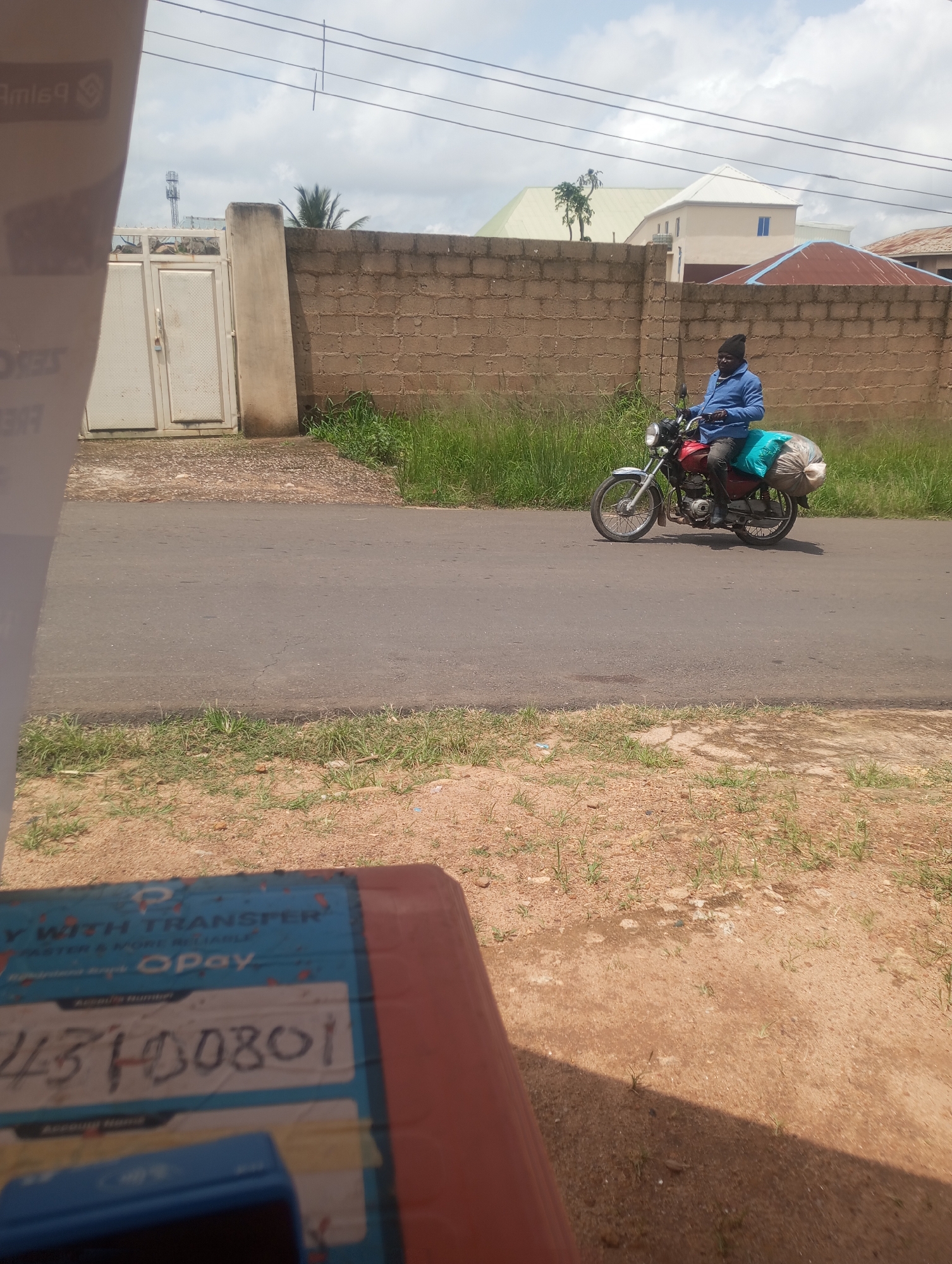 Ordinary morning street life along a Jos road