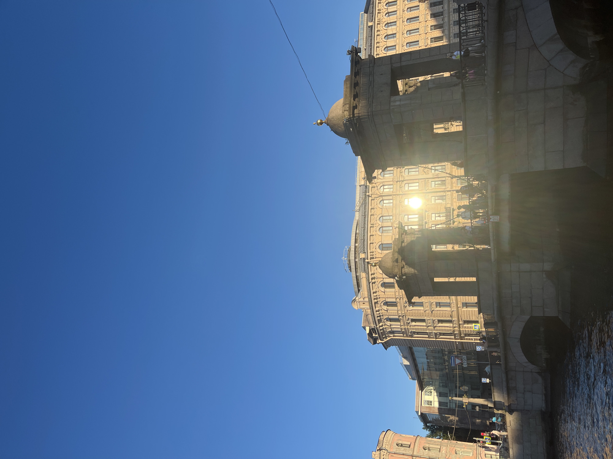 Strolling Saint Petersburg's Griboyedov Canal on a sunny afternoon