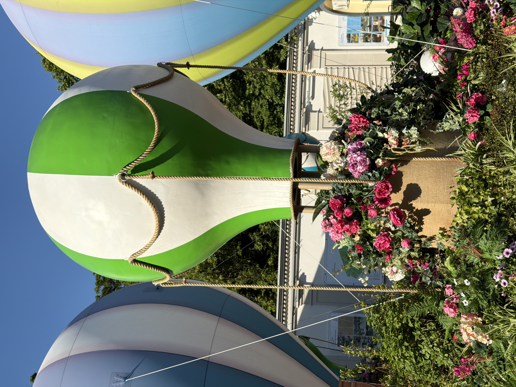 Moscow pedestrians enjoy festive balloon display on sunny afternoon