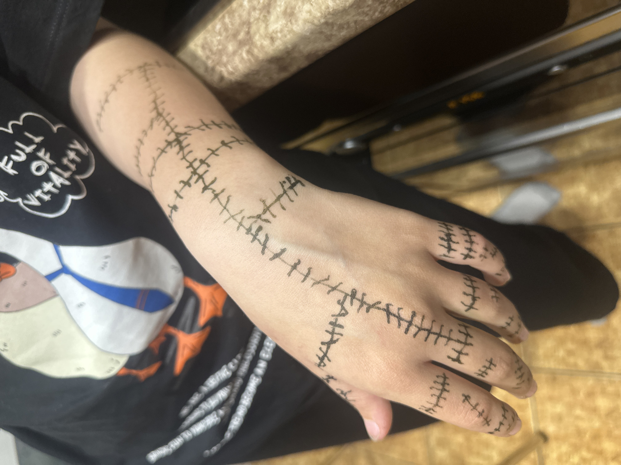 Resident documents daily life including stitch-art body drawings in Sayanogorsk