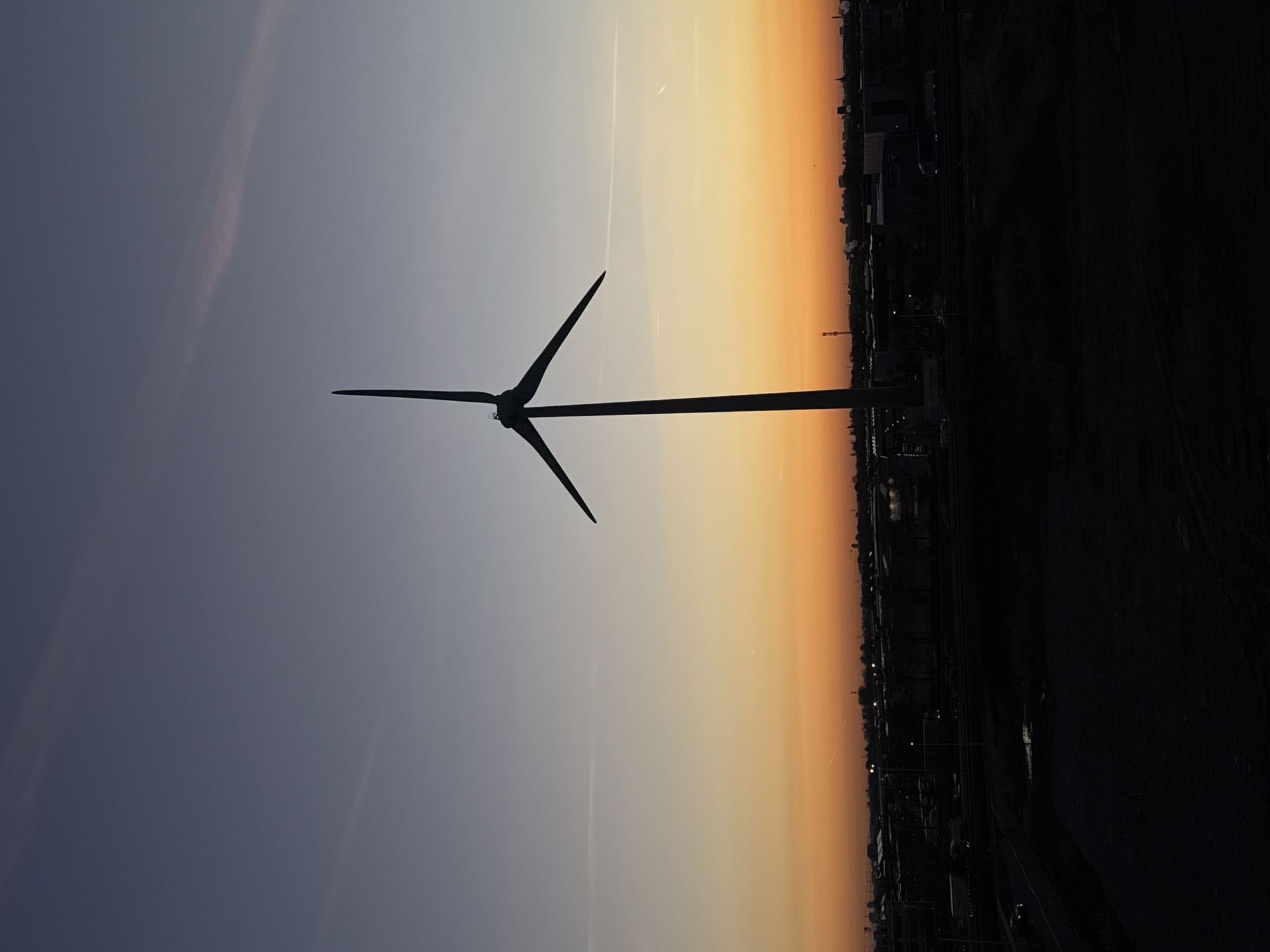 Wind turbine sunset captured in Maasdijk, Netherlands