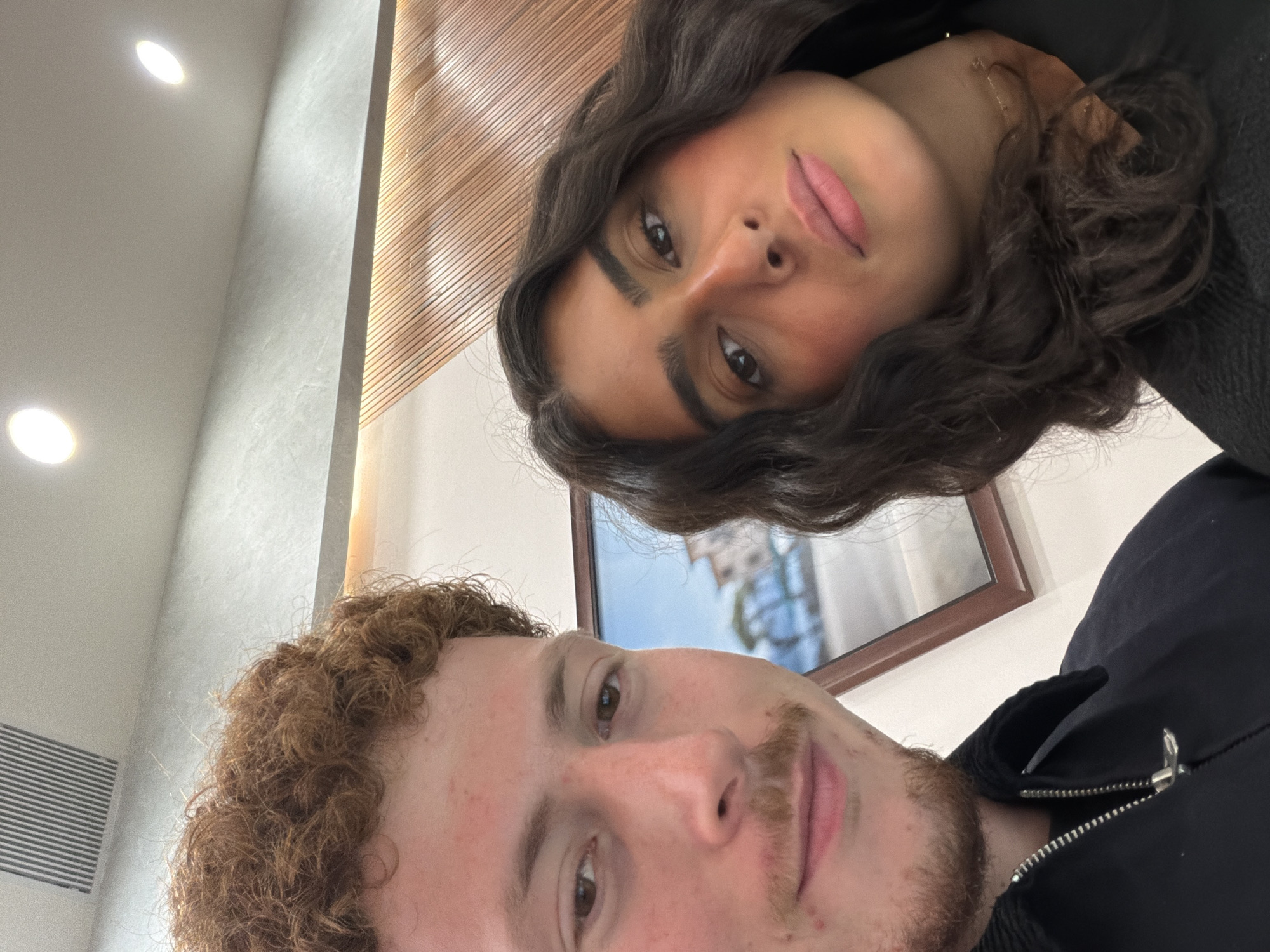 Two people take indoor selfie in New York