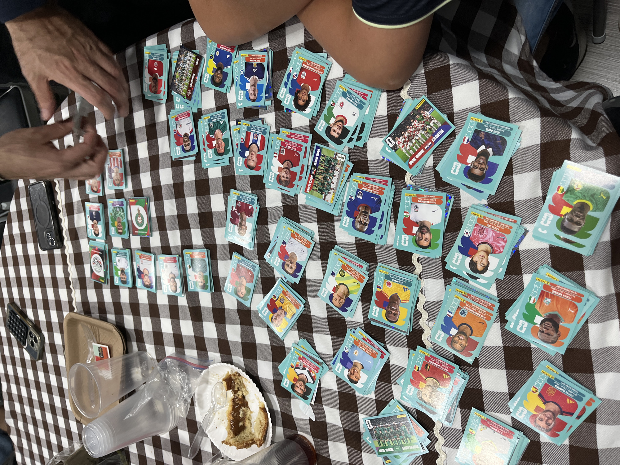 Friends gather for FIFA World Cup sticker trading session