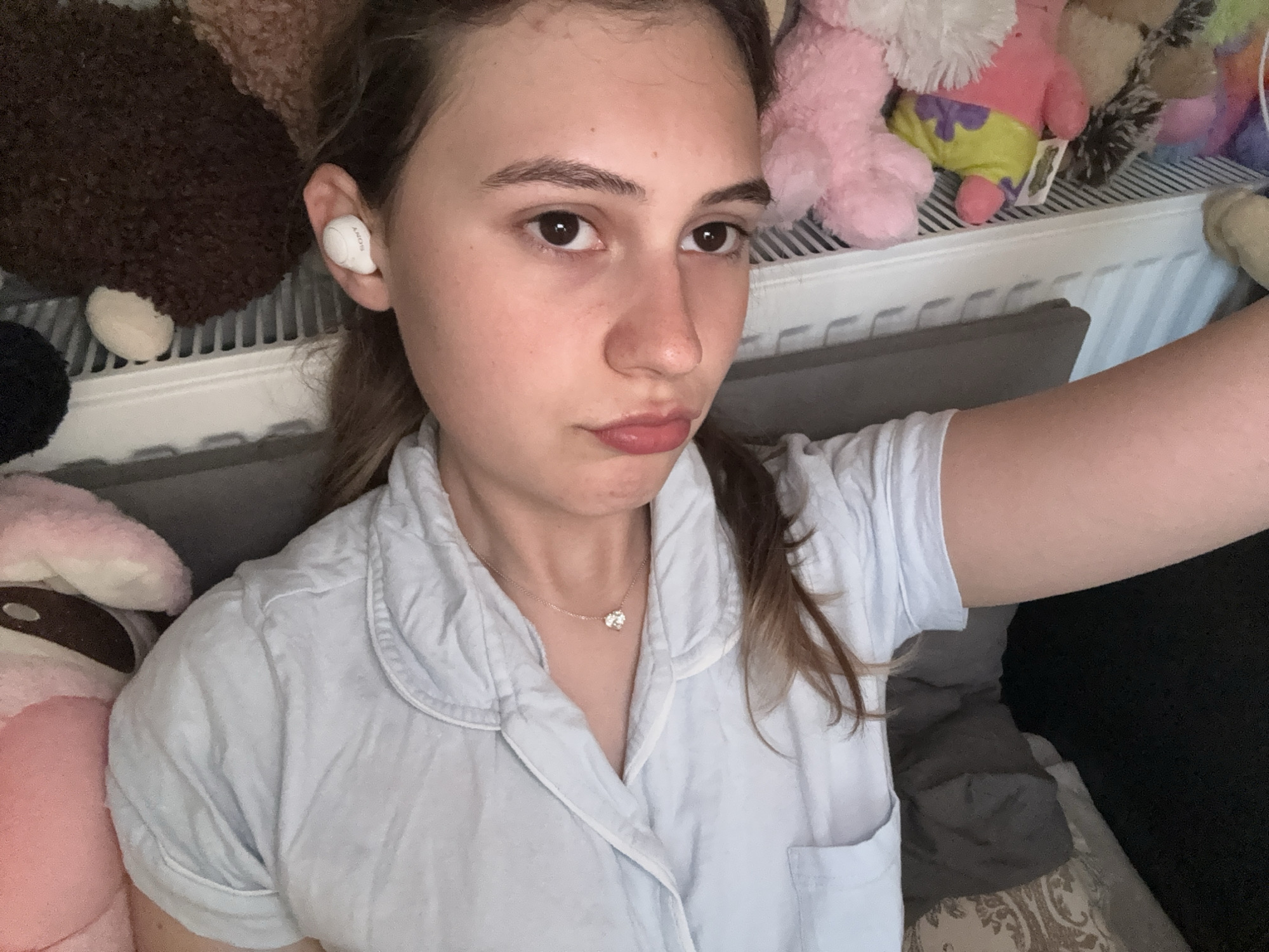 Woman takes playful bedroom selfies with stuffed animals in Bulgaria