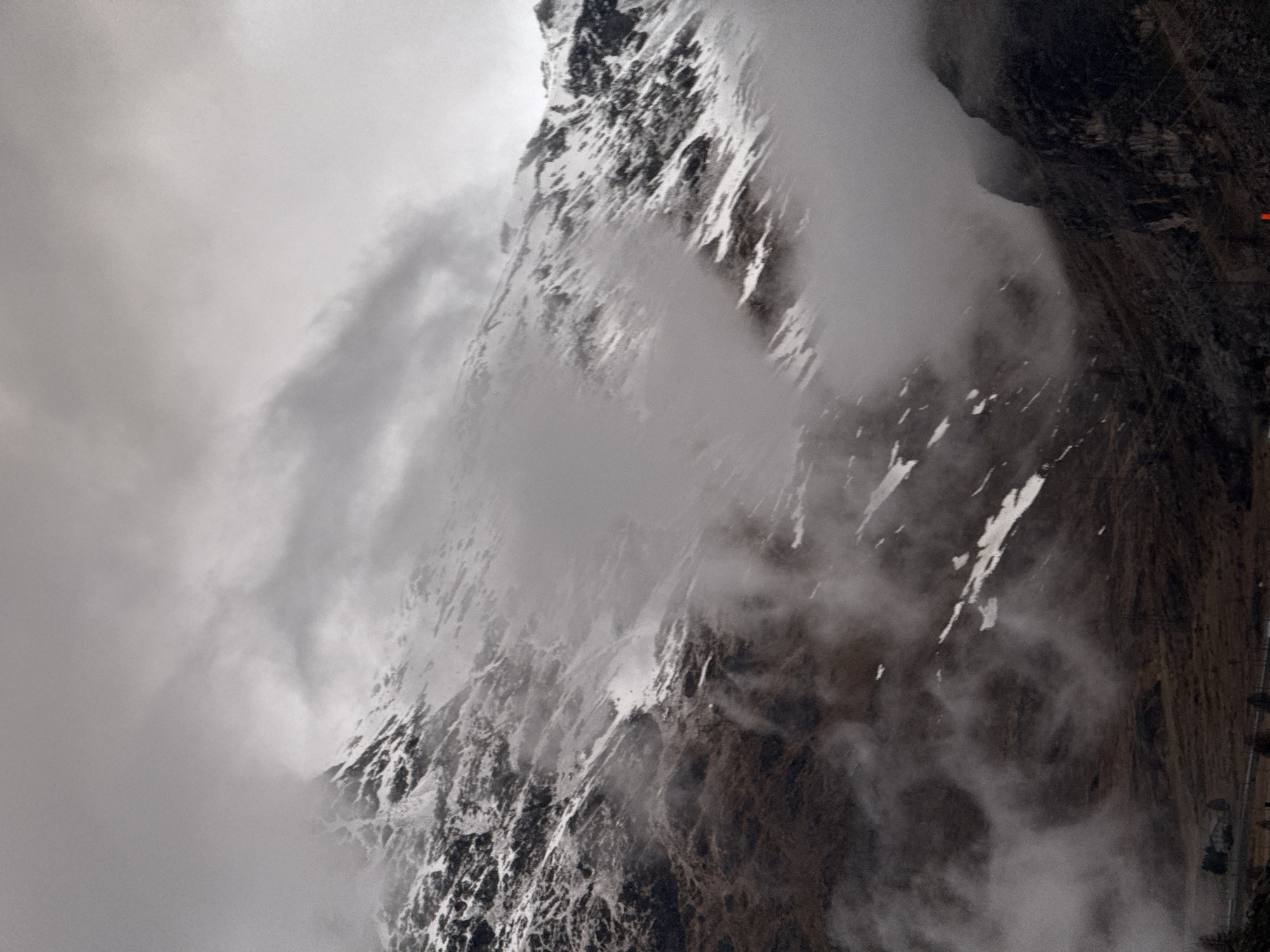 Misty alpine landscape observed near Pontresina, Swiss Alps