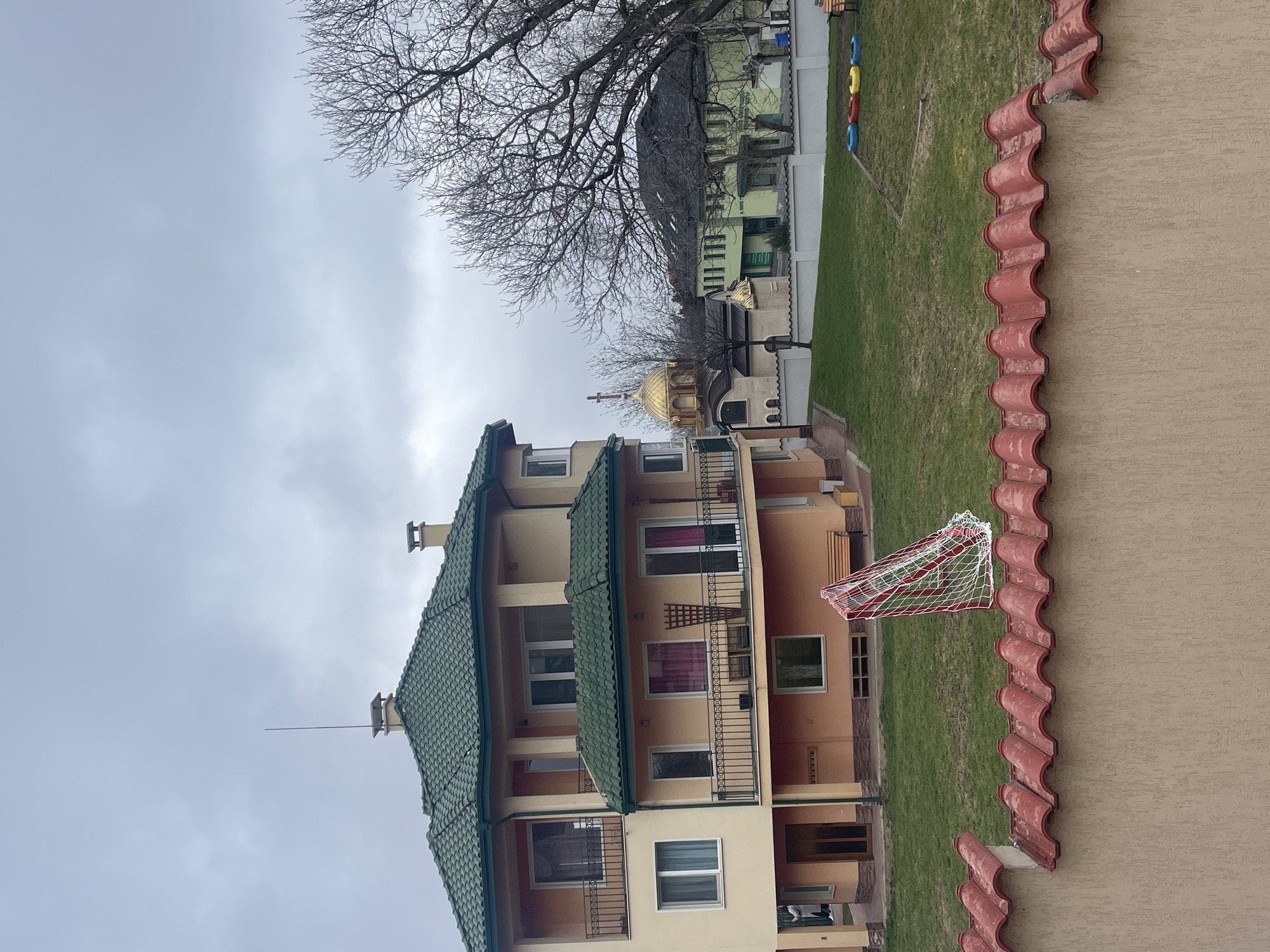 Sofia building observed near soccer field and domed church