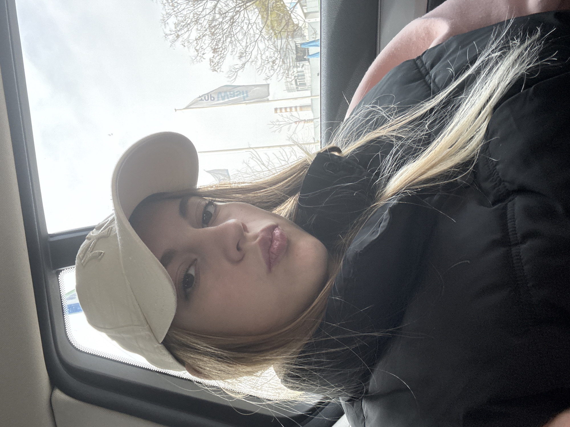 Woman in baseball cap observed in vehicle in Sofia