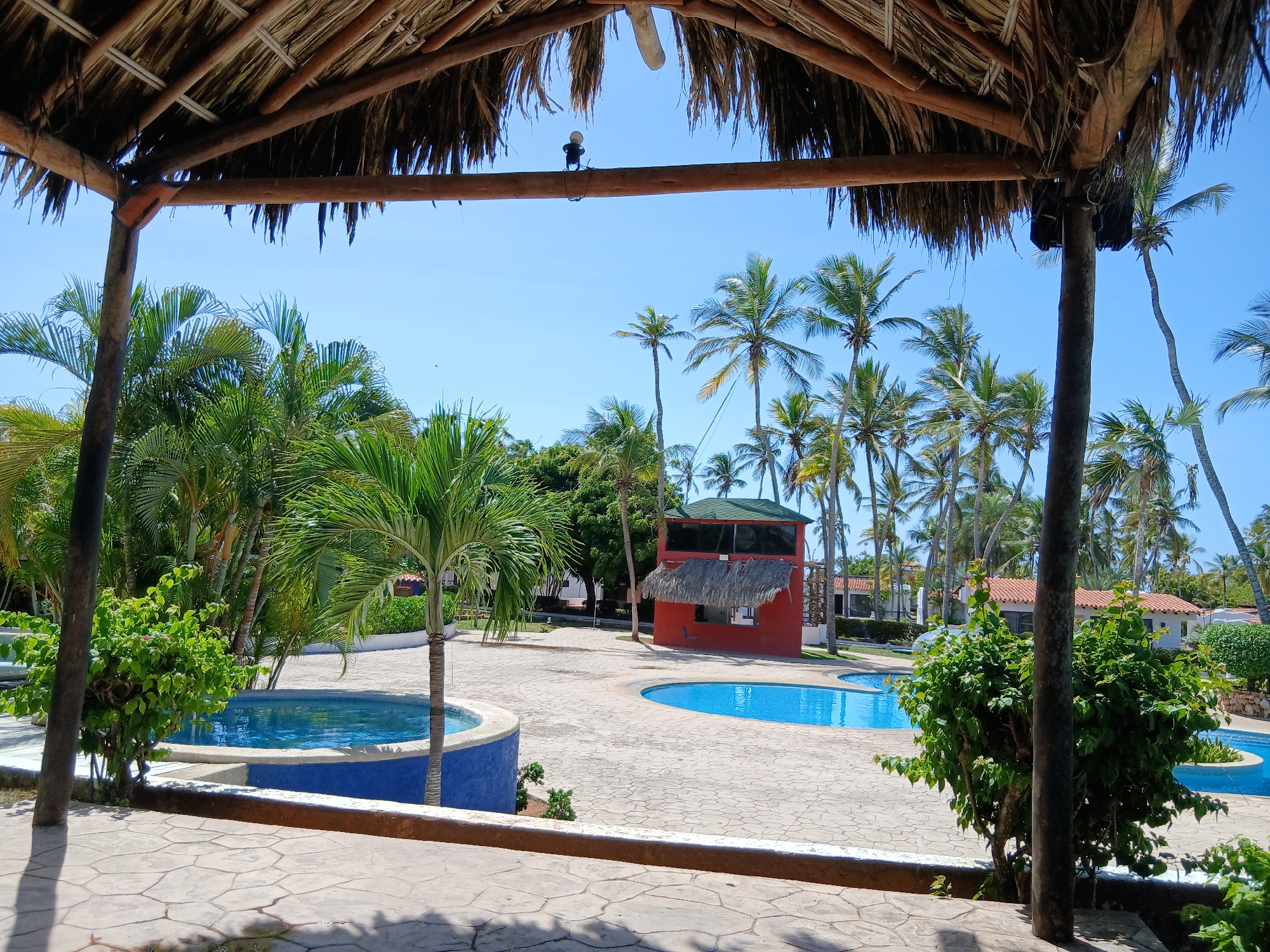 Woman documents resort visit at Playa El Agua Venezuela