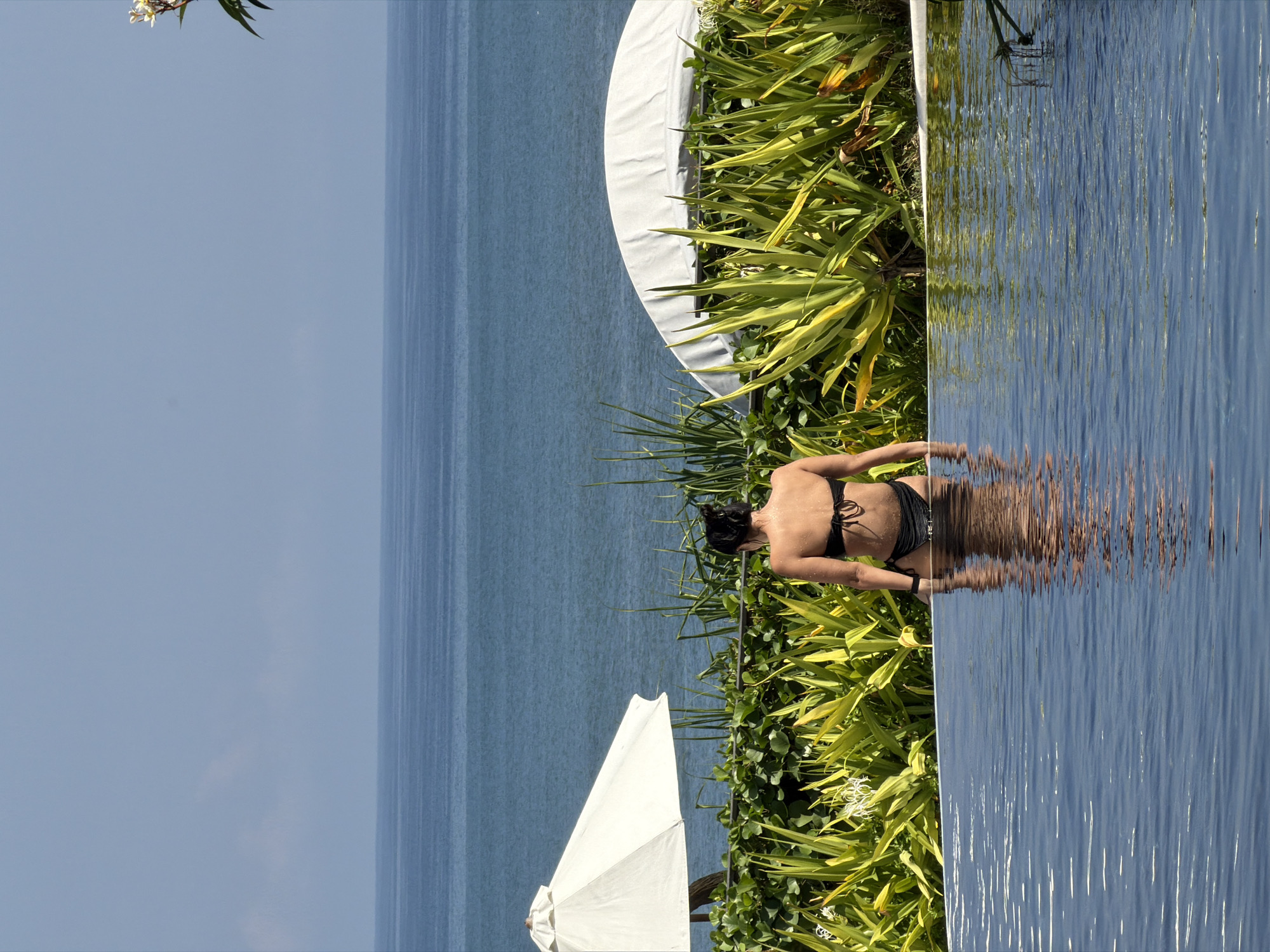 Poolside, sculptures, and coastal views in Kediri, Bali