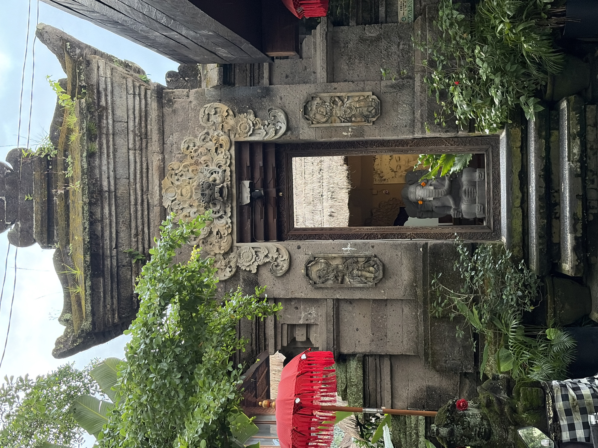 Ubud street level: shops, shrines, and Balinese detail
