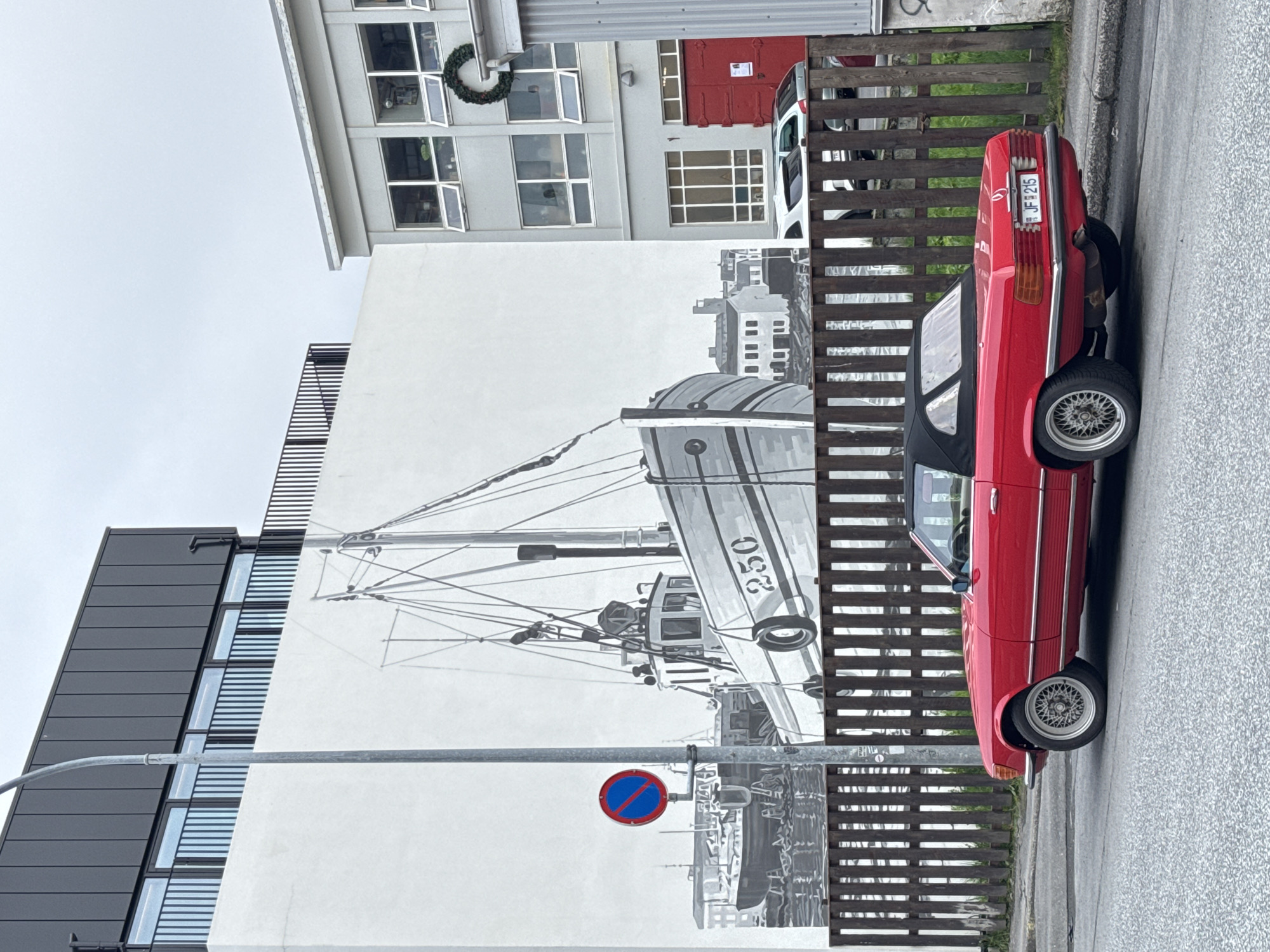 Red Mercedes spotted in Reykjavik with restaurant dining observed