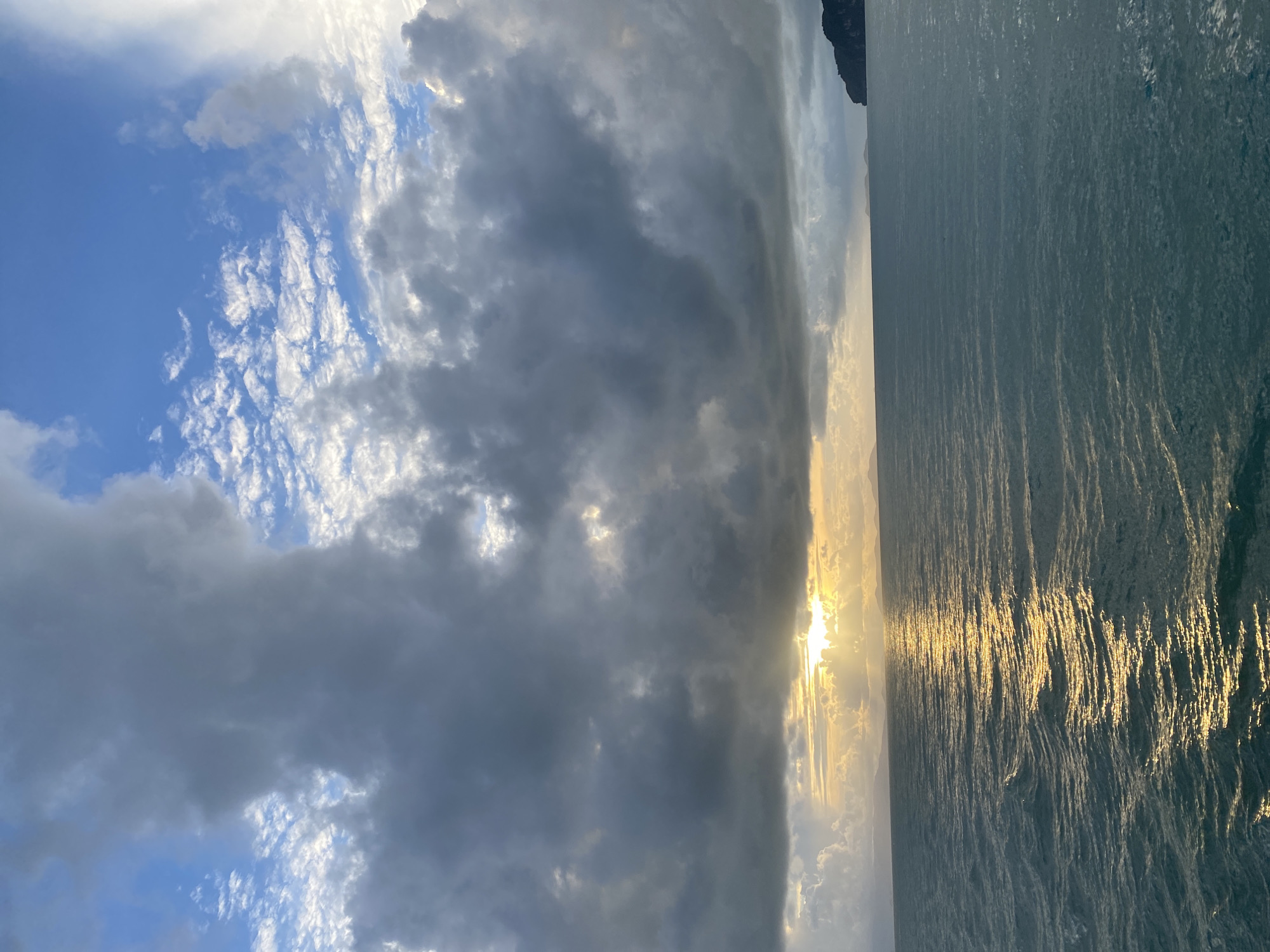 Sunset captured over Don Sak coastal waters with ferries
