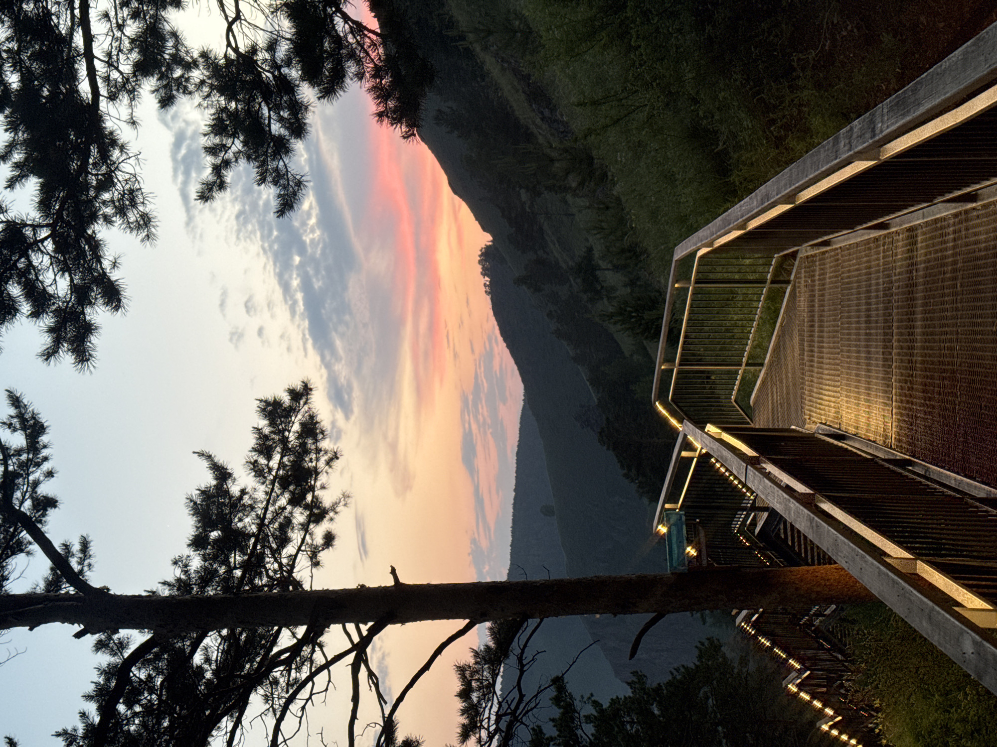 Illuminated mountain staircase documented in Krasnoyarsk forest viewpoint